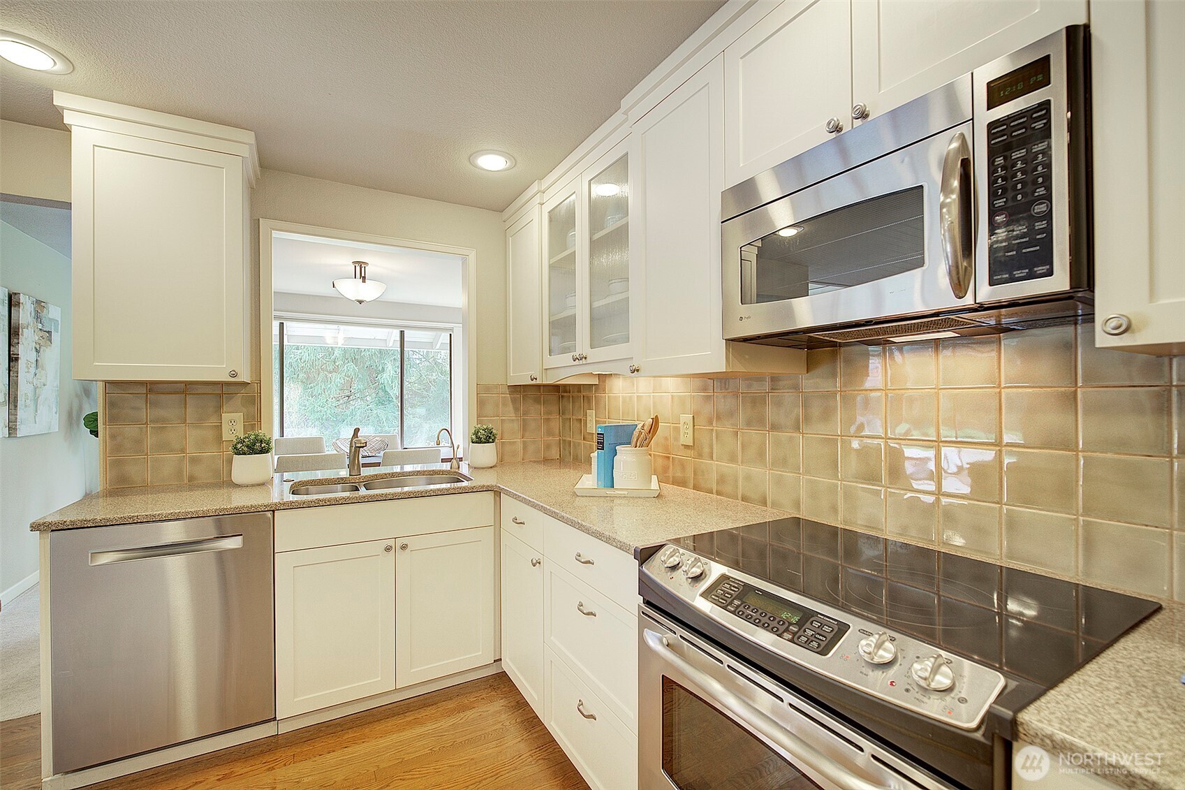 Kitchen openness allows plenty of light.