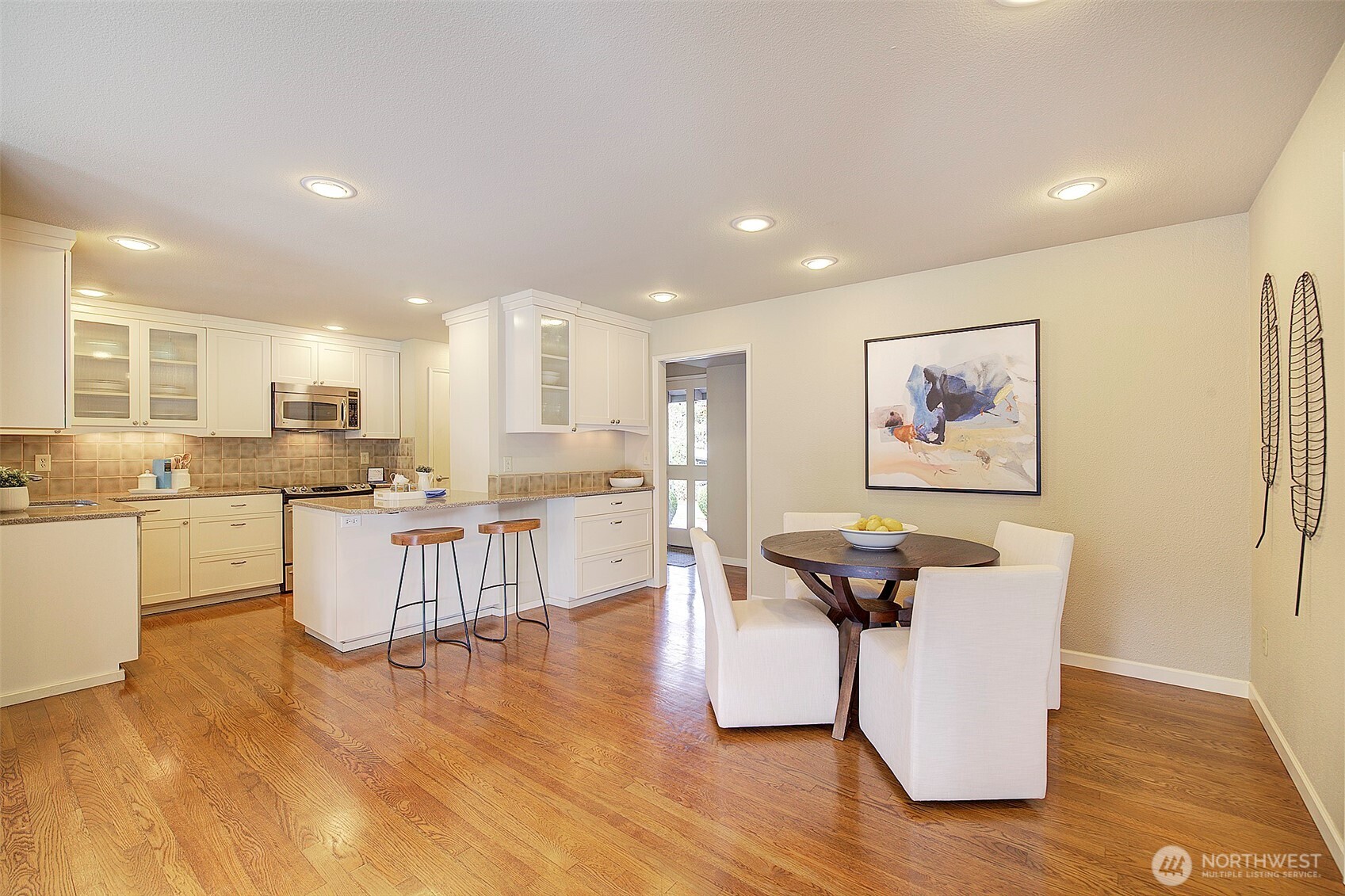 Kitchen flows to eating area.