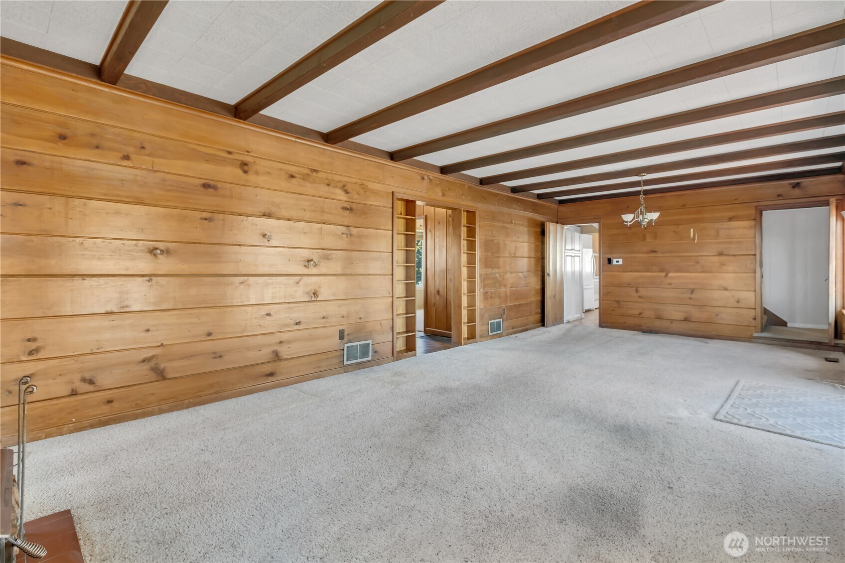 Orginal wide wood paneling. Expansive views to Mountain and valley.