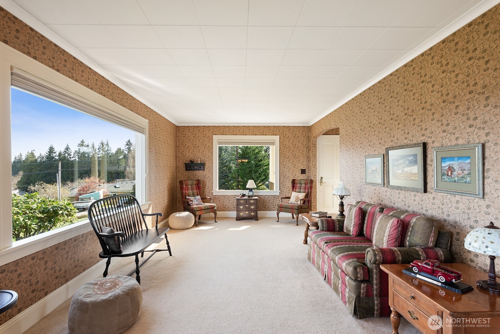 Charming Living Room with designer wallpaper