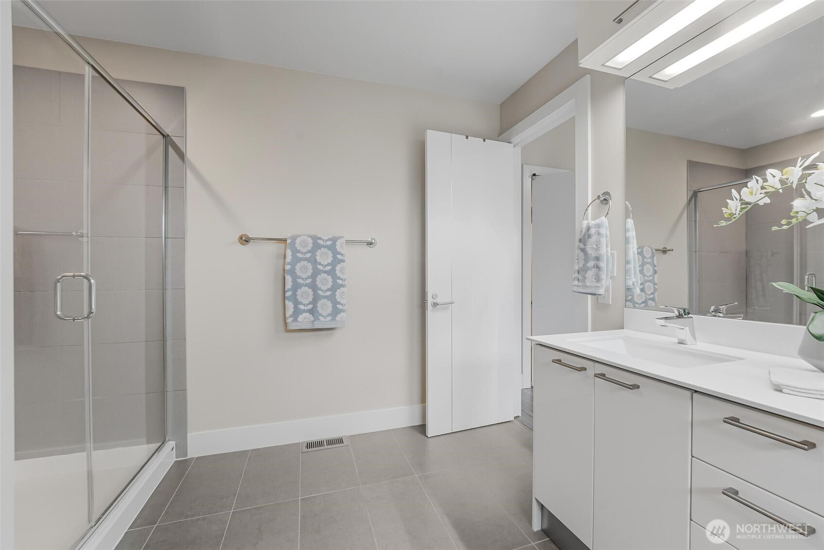 Spa-like primary bath. No running out of hot water having a tankless water heater