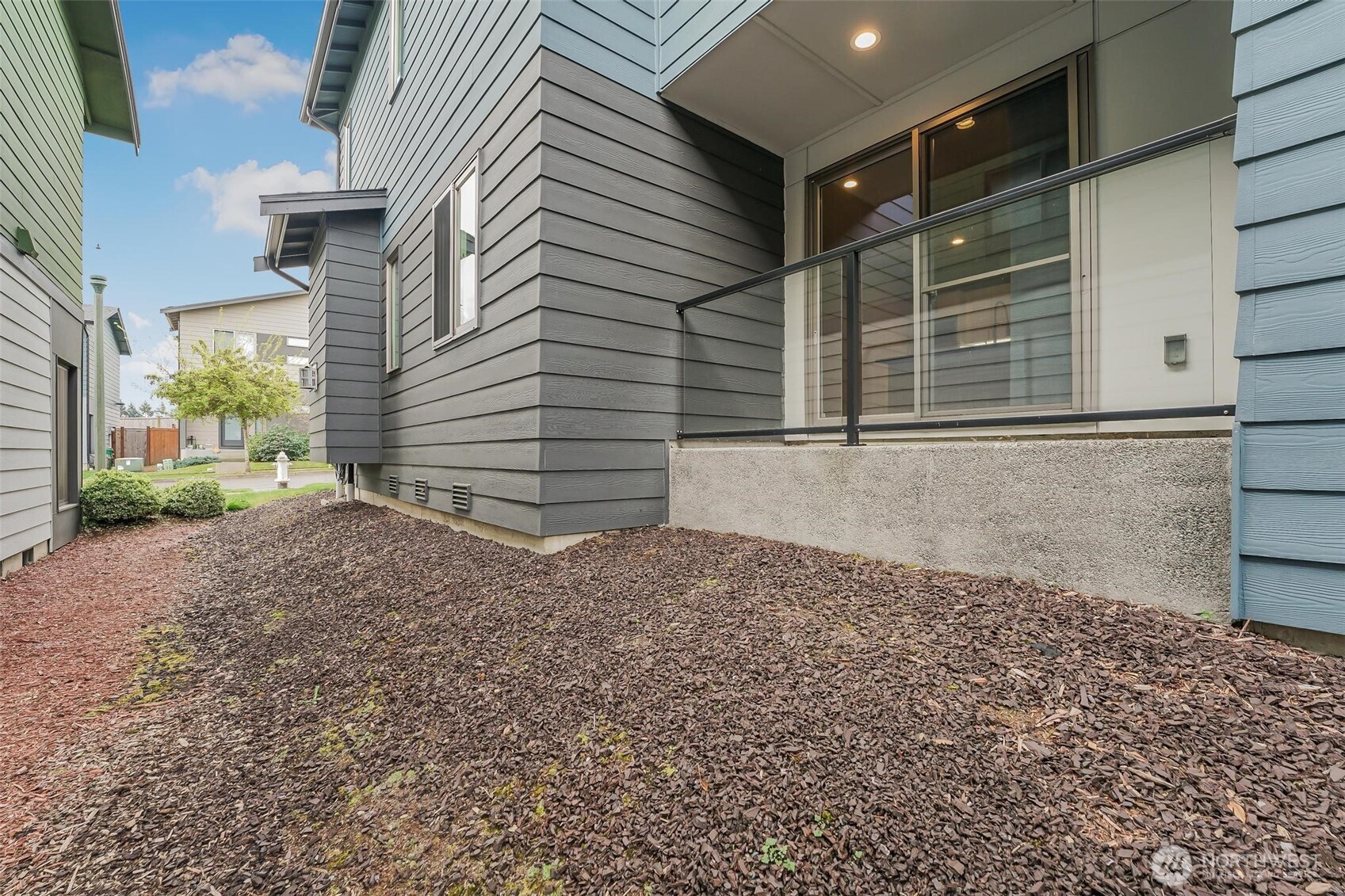 Slider door enters dining/kitchen area