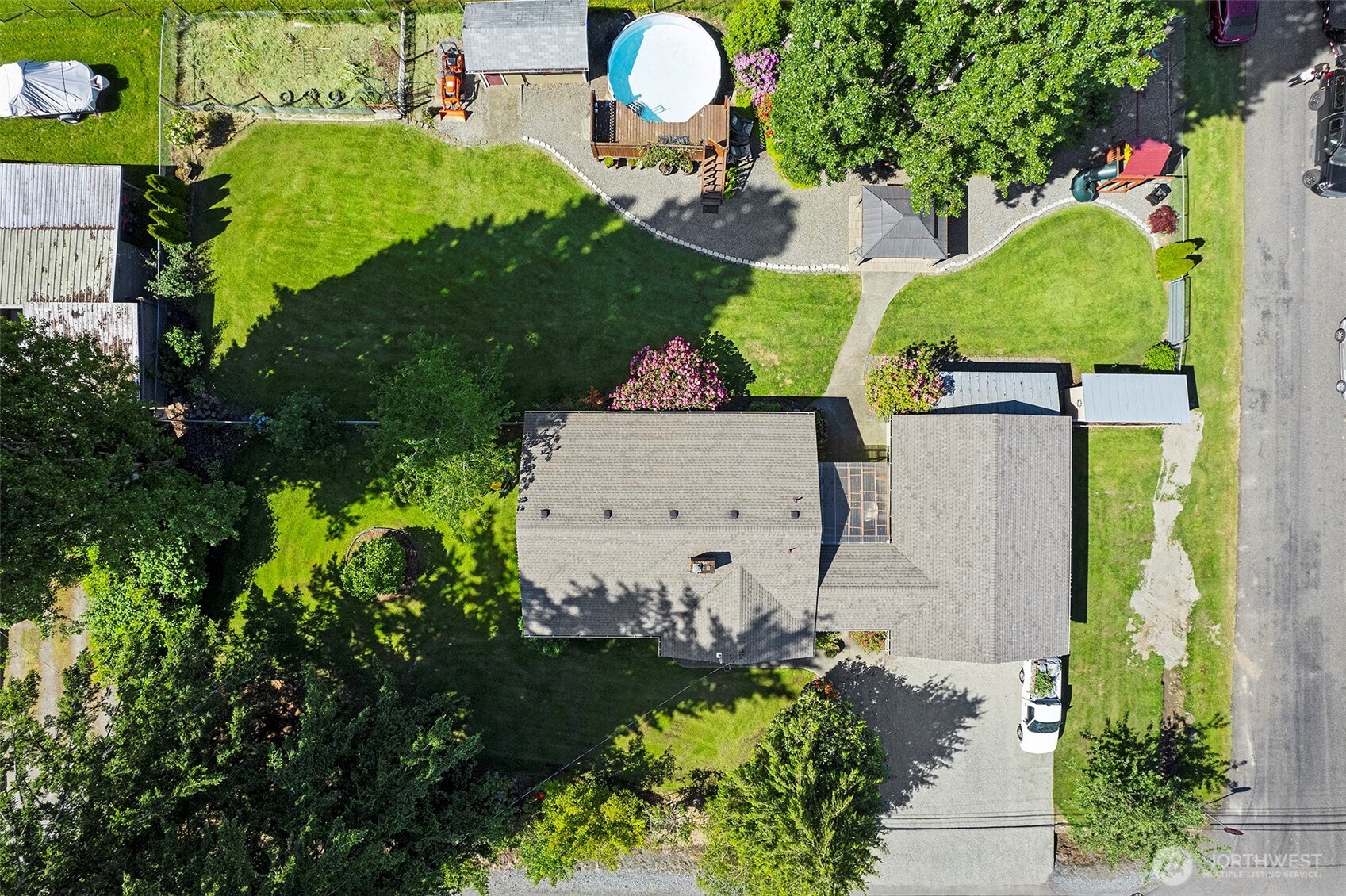 ~Aeriel view of Top of property Showcasing a Brand New Roof~