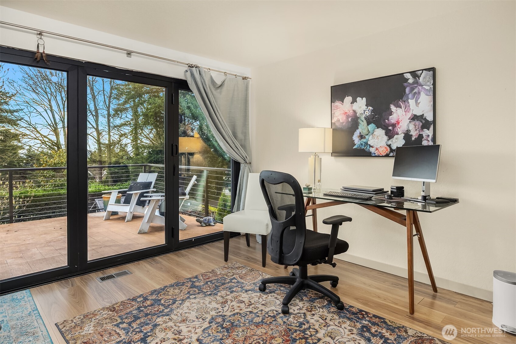 This BR/Office sits next to the Primary. Owners plans included taking out the wall between to make a true 'Primary suite', with Nano doors to the deck.