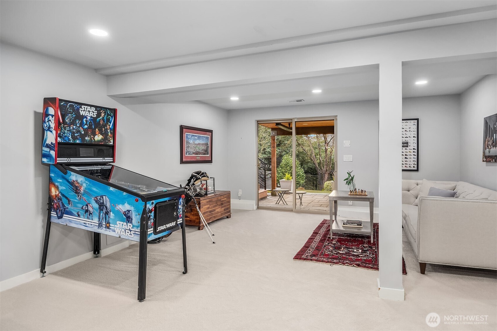 Multiple areas for games, play, conversation...and sliding door opens to the fantastic outdoor spaces.