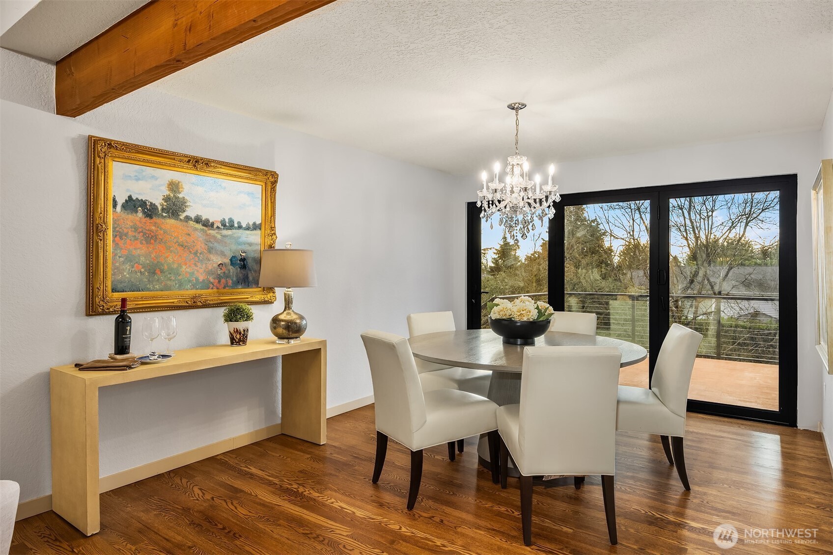 The adjoining dining room can easily hold a large dinner party.