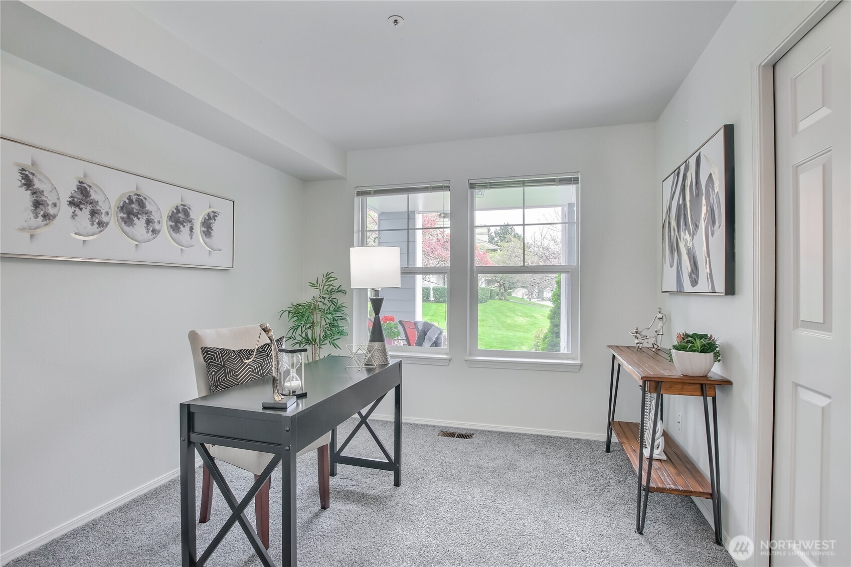 second bedroom, staged as office space