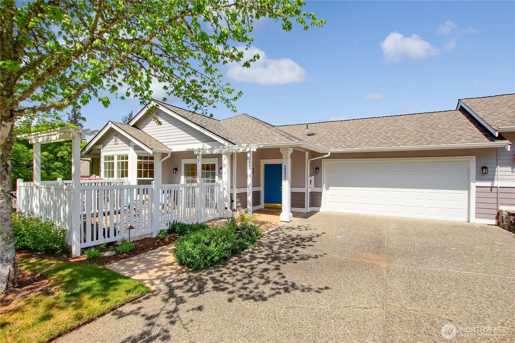 Forest Village condo home with 2 car garage