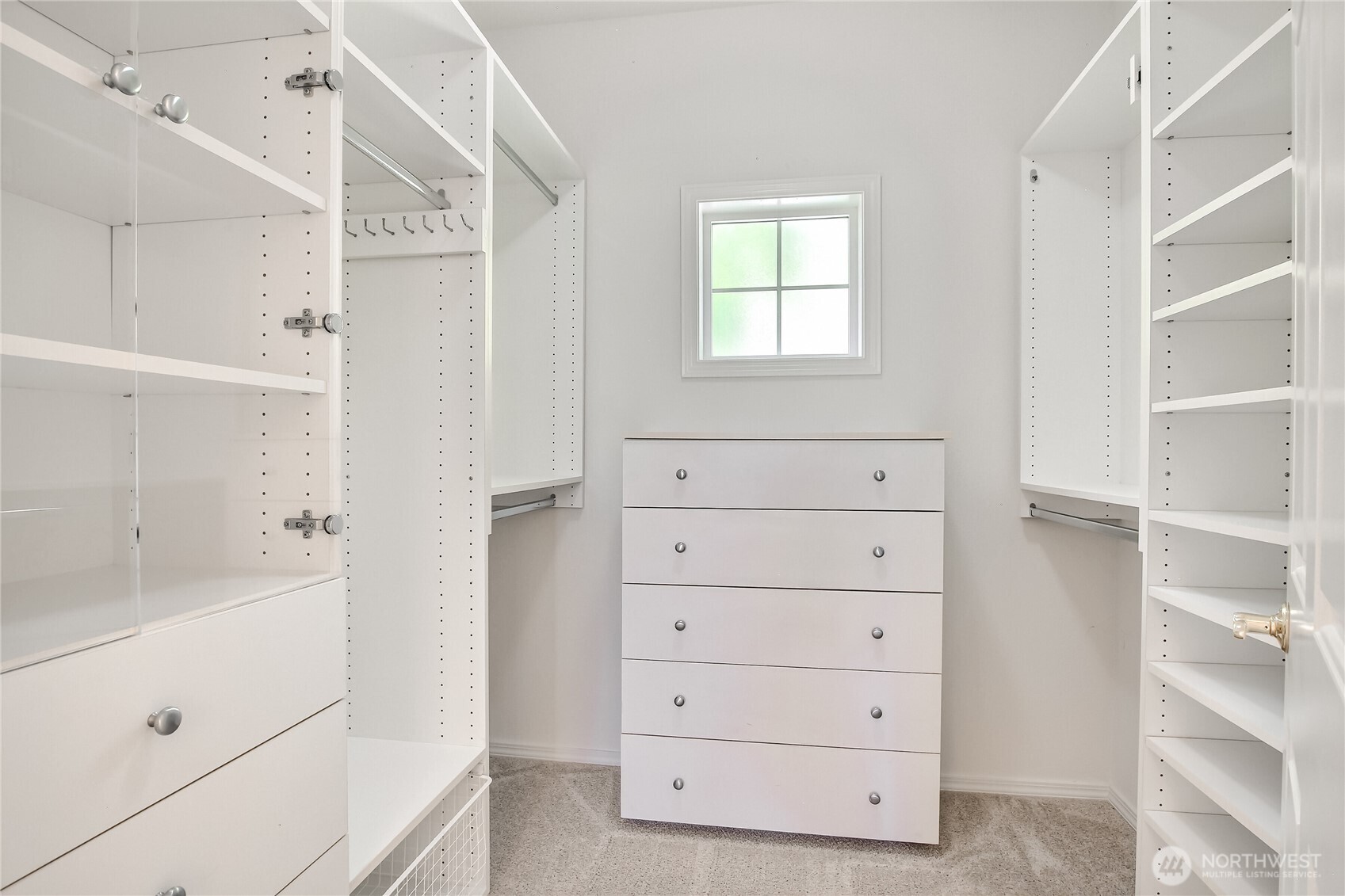 Custom primary closet with california closet kit