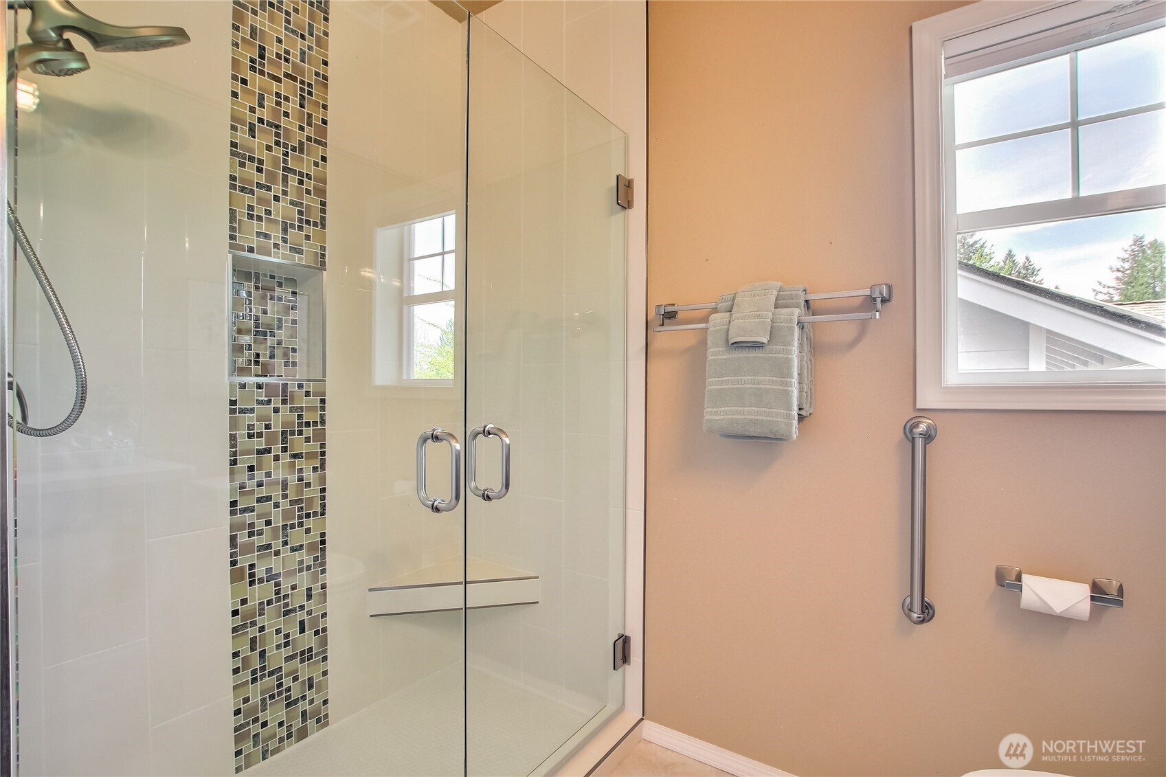 second luxury bath with custom tile work.