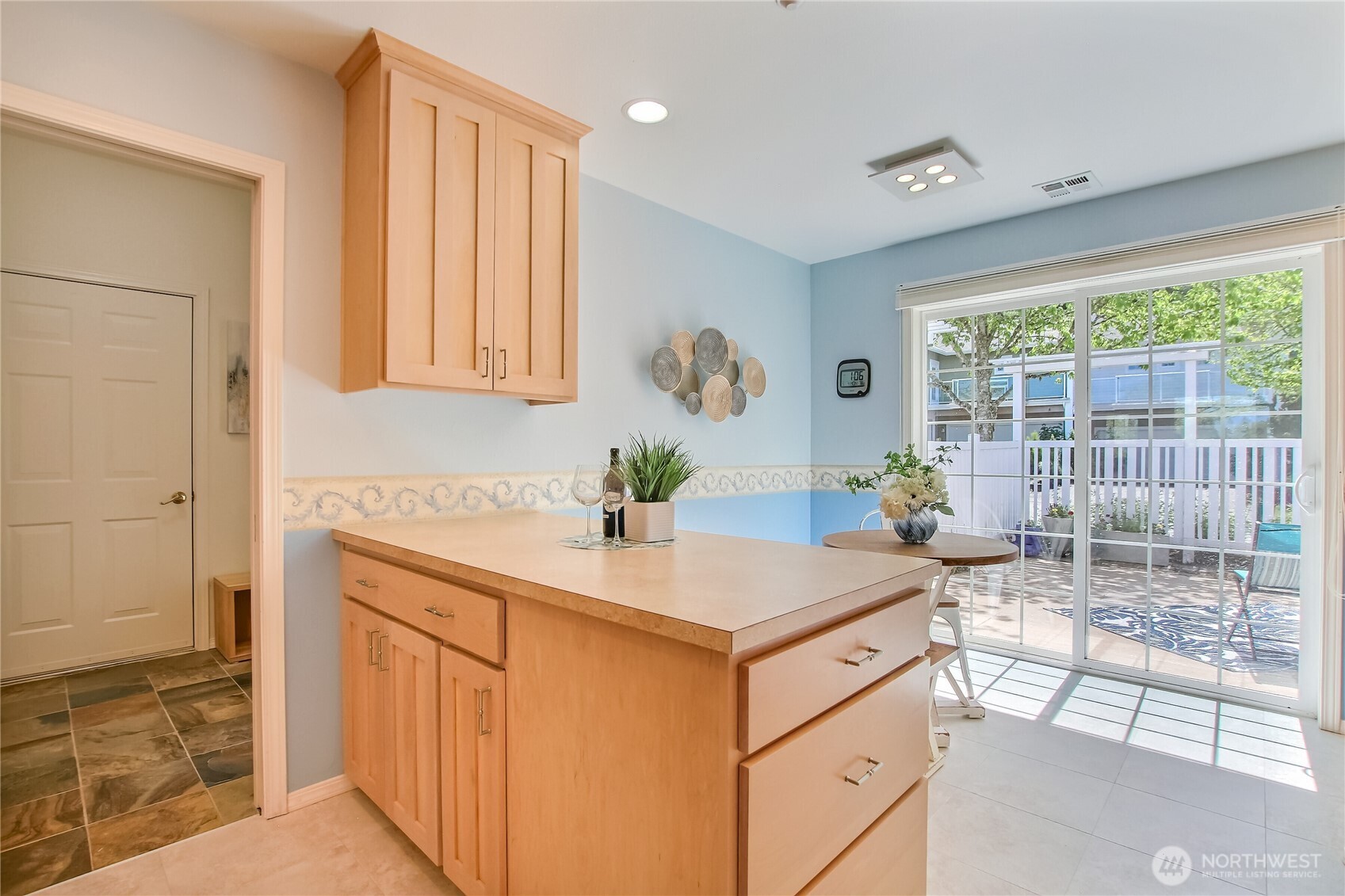 Peninsula in kitchen for plenty of prep and storage space.