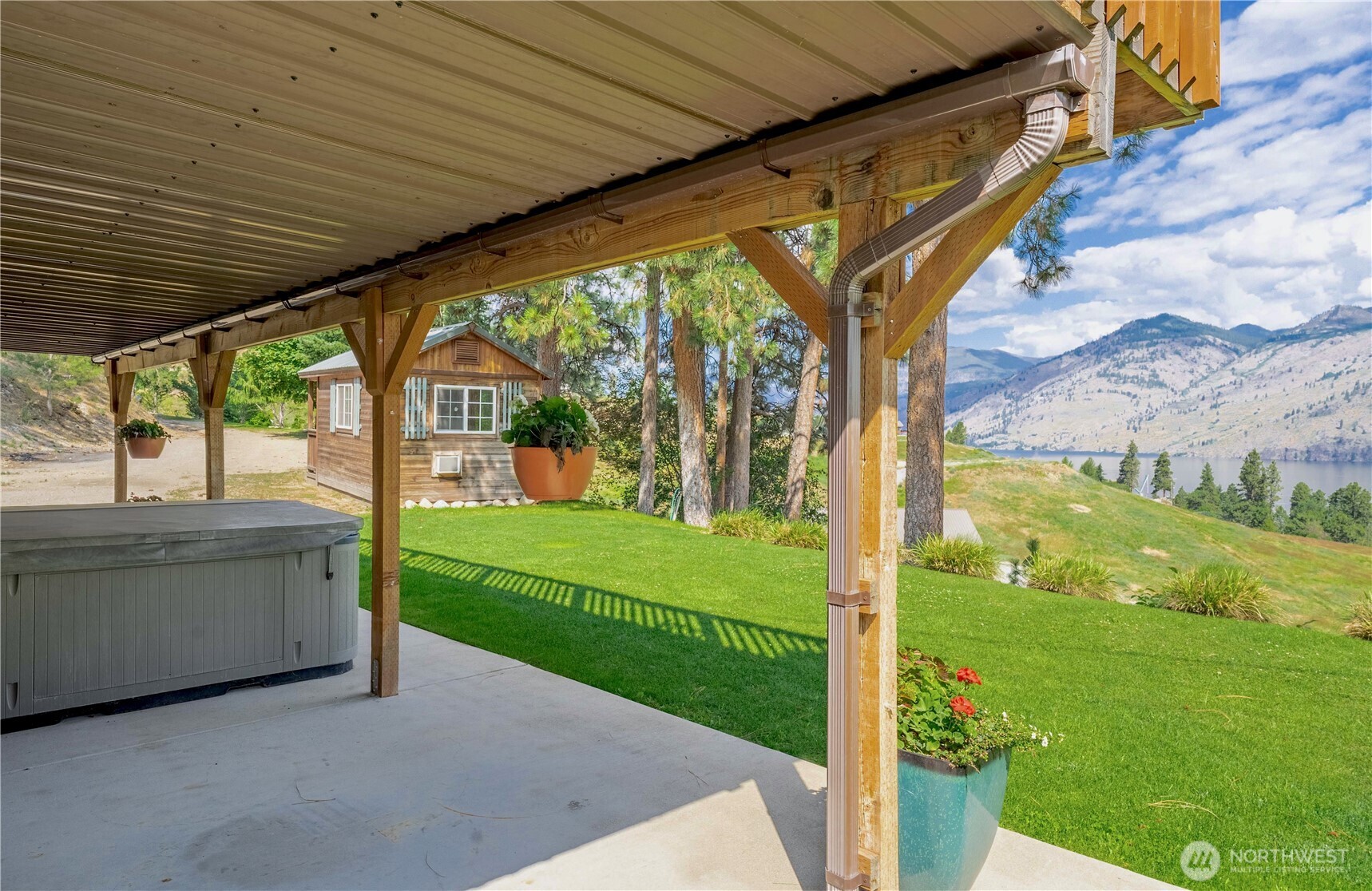 Exterior view of private spa w/ lake views.