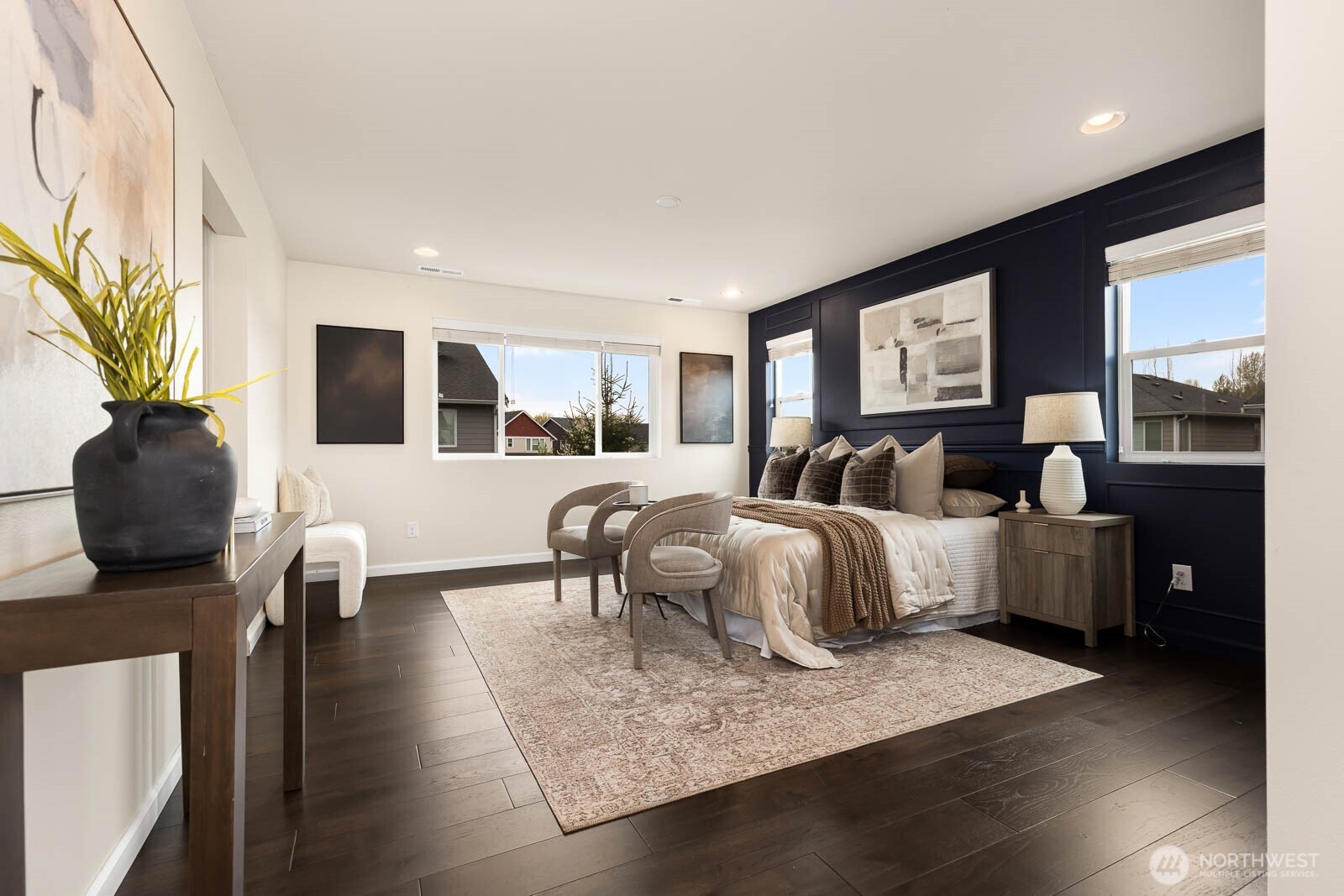 Large primary bedroom, hardwood floors