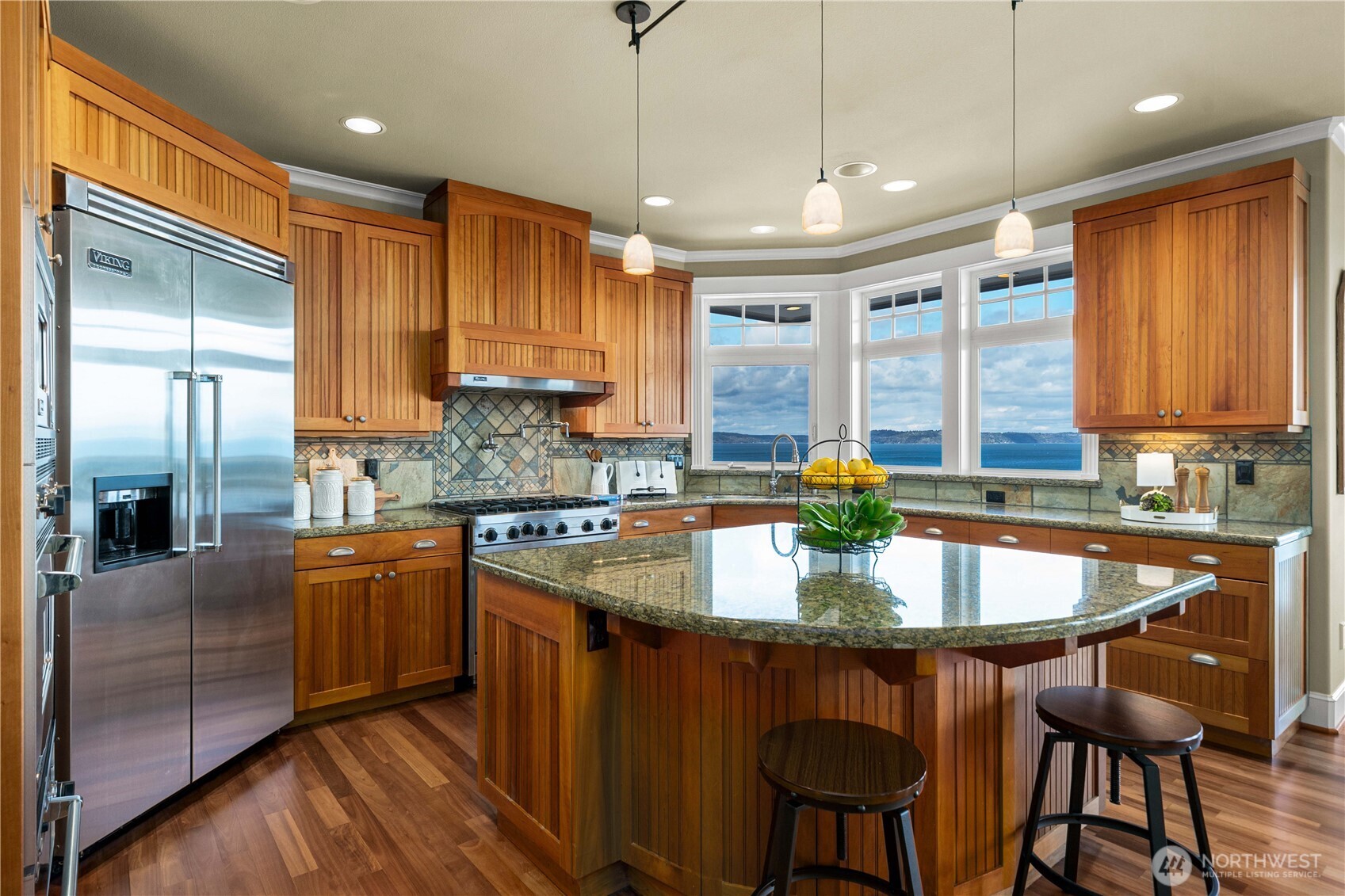 Gather around the island in this main floor kitchen