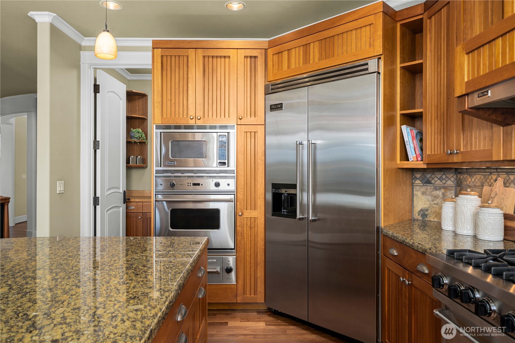 There is a butler's pantry and wet bar adjacent to the kitchen