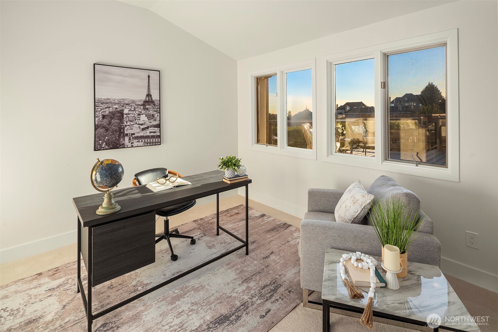 Primary suite with adjoining office — a private retreat where restful comfort meets focused work, bathed in morning light.