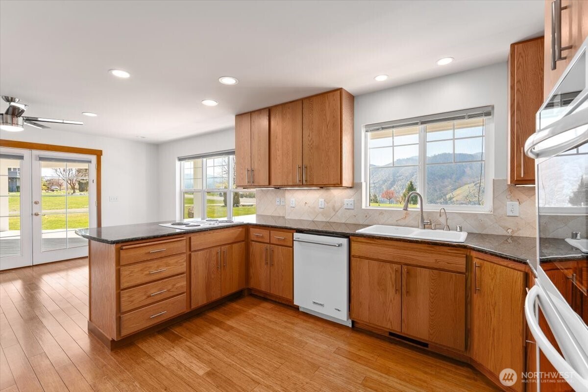 Views out to the front yard and of Lake Chelan from the kitchen