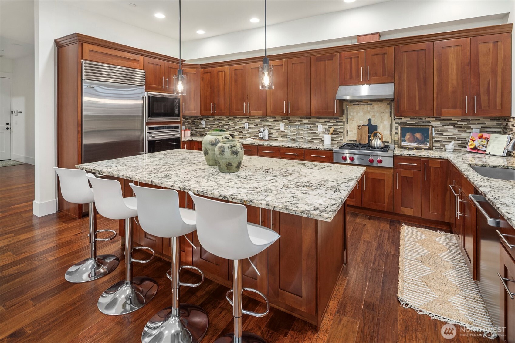 Chef’s kitchen with expansive countertops—perfect for cooking, gathering, and entertaining.