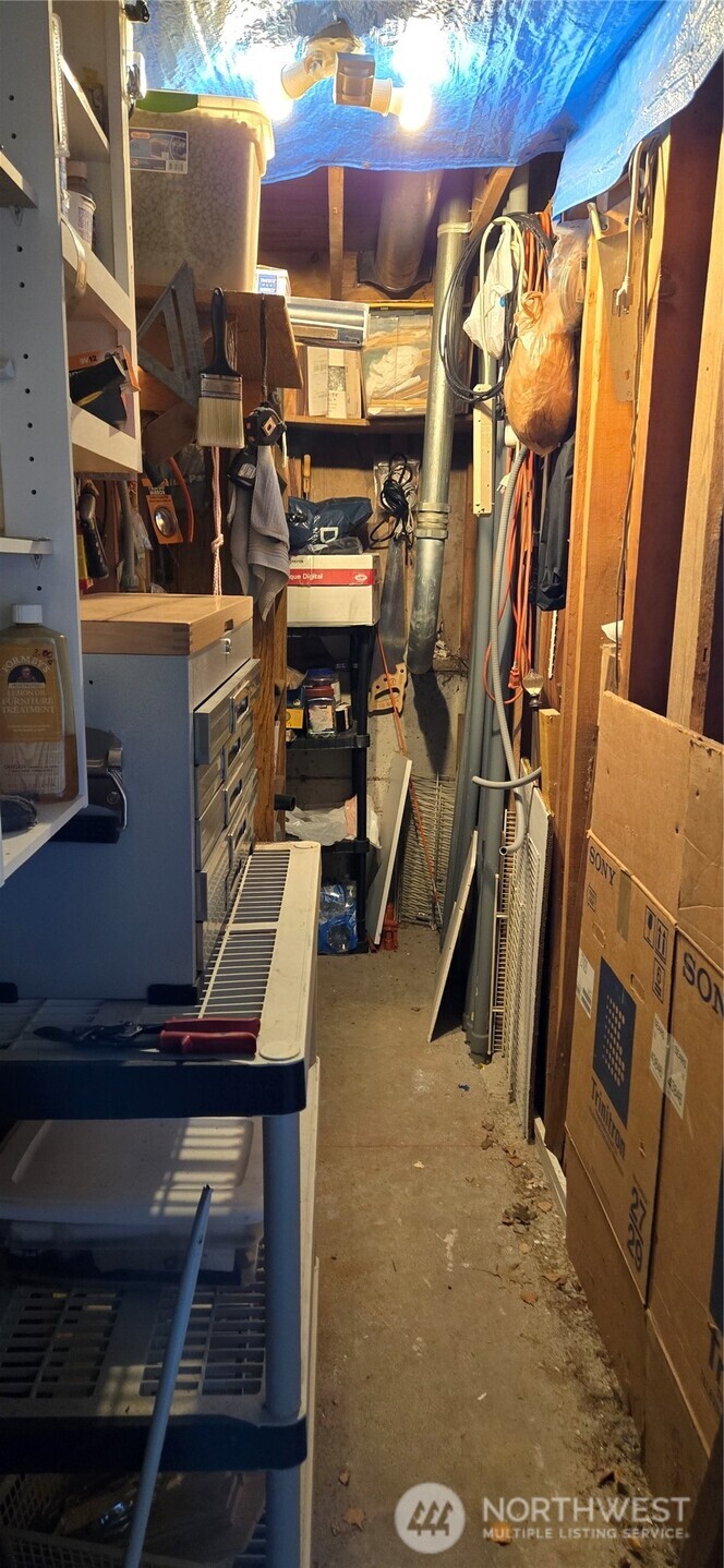 Storage Area across from front door.