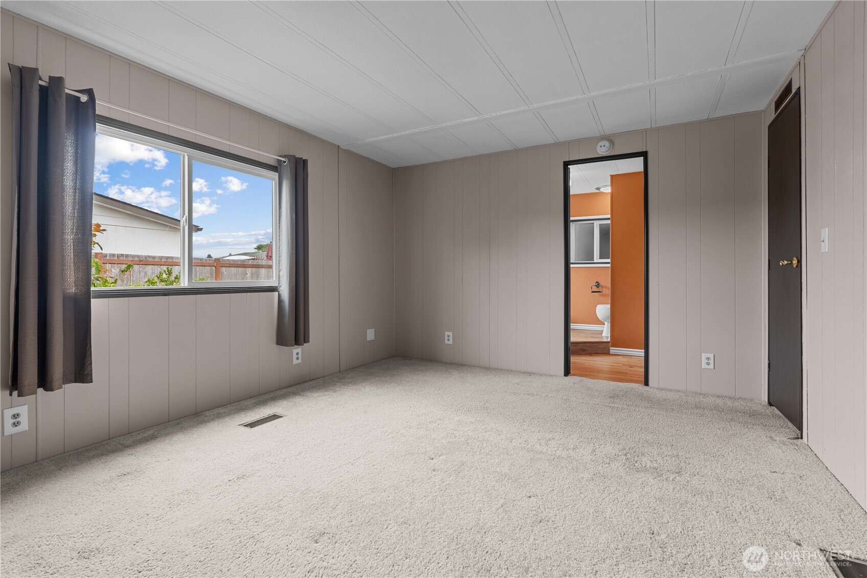 Primary bedroom has been freshly painted and has en suite bathroom.