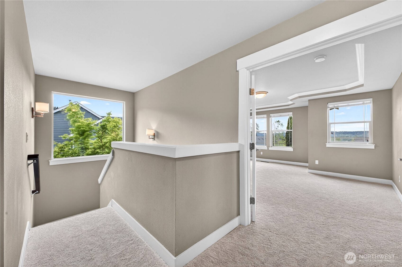 Spacious upstairs landing filled with natural light and a comfortable, open feel.
