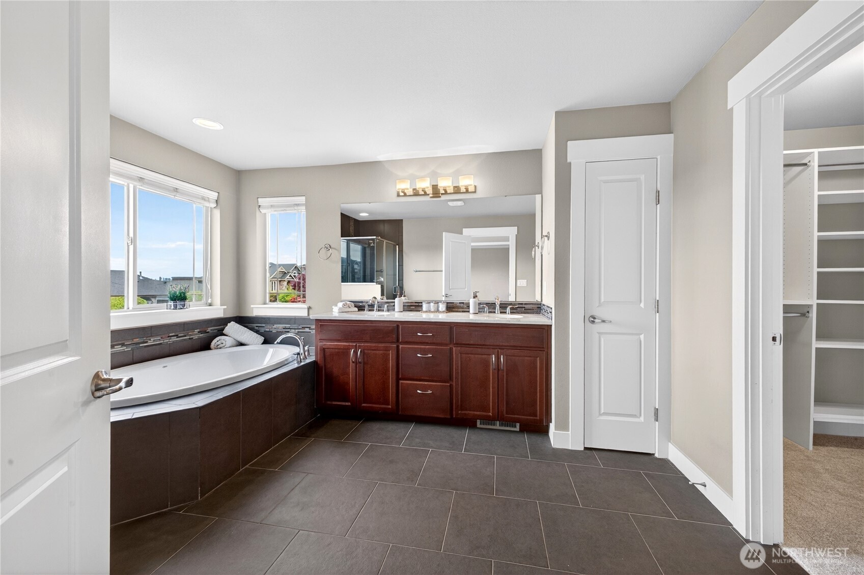 Additional view of the primary bathroom.