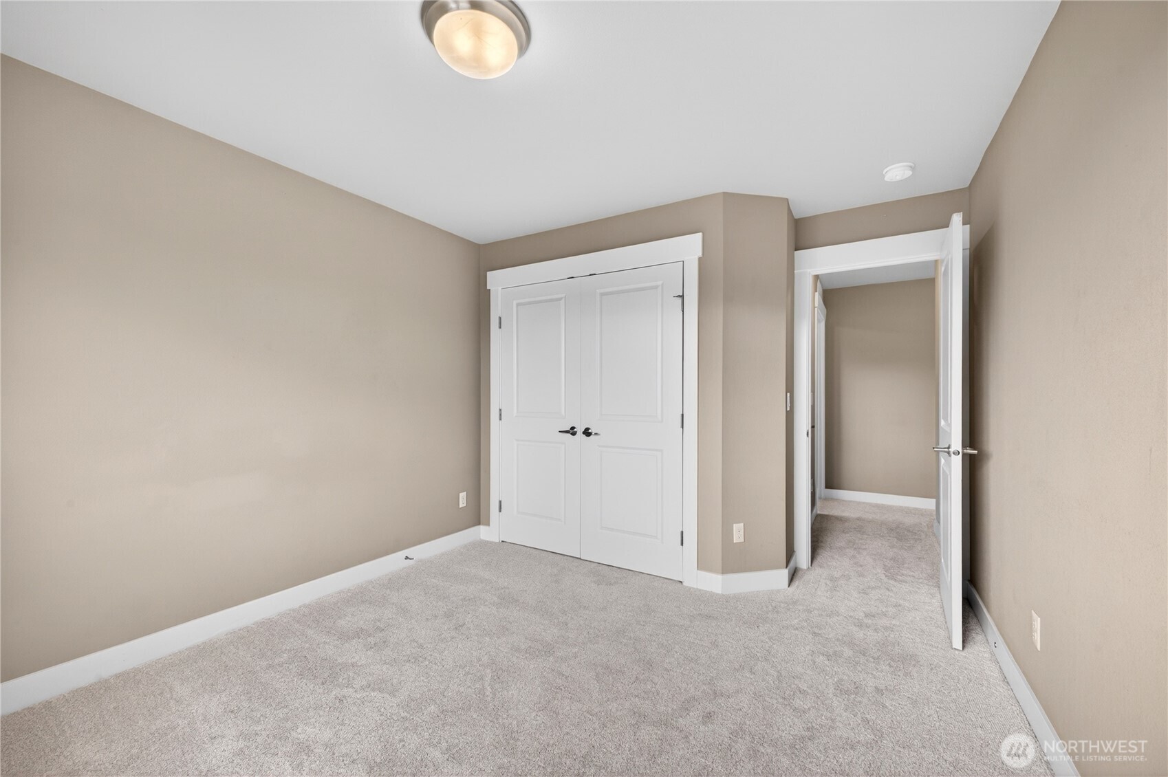 Second and third bedrooms are nicely sized with ample closet space and easy access to the main bathroom—perfect for guests, home office needs, or everyday living.