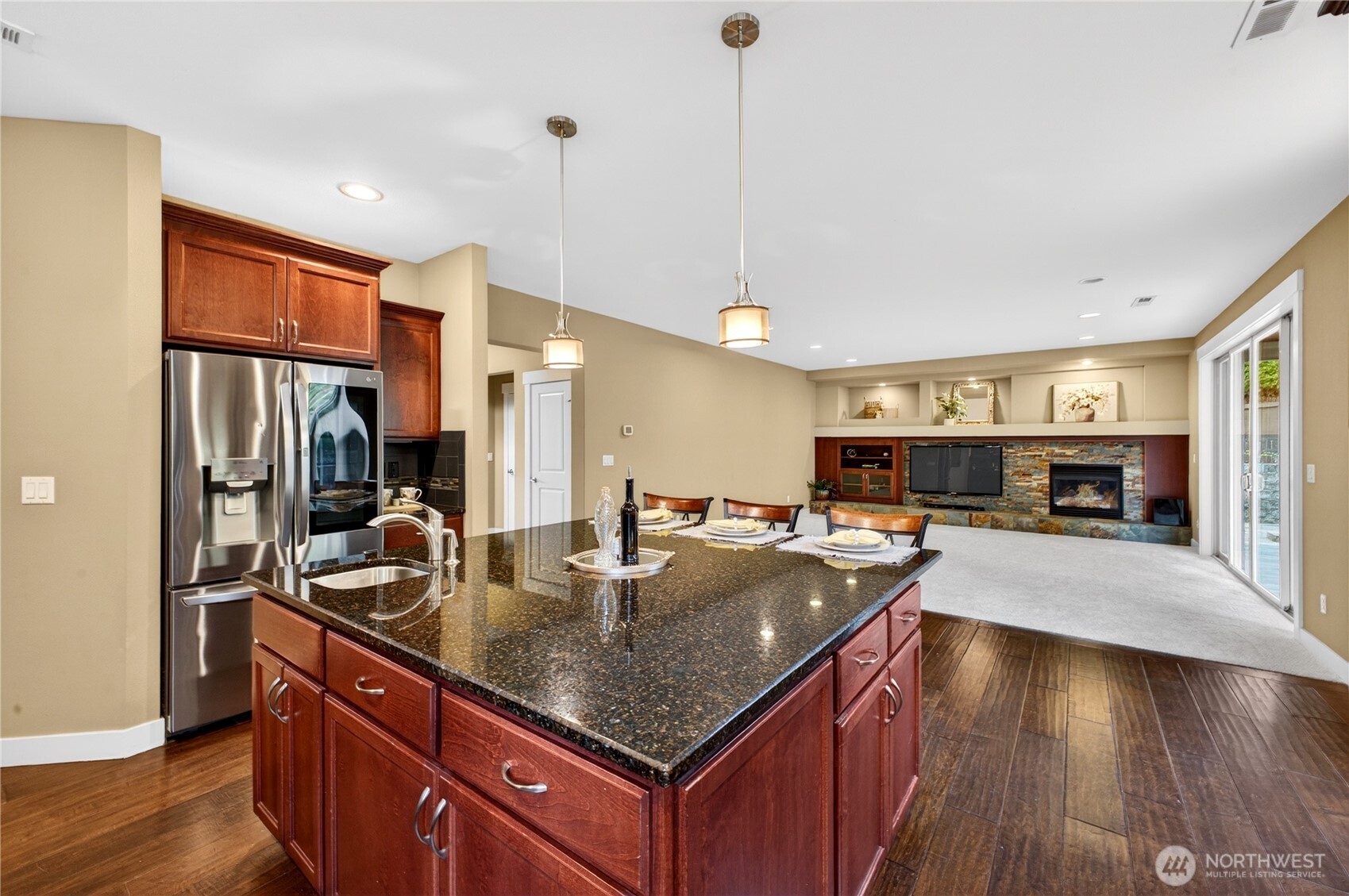 The open-concept design was created for seamless living—perfect for both entertaining and everyday comfort. The great room flows effortlessly into the kitchen and out to the covered patio, offering plenty of space to gather and relax.
