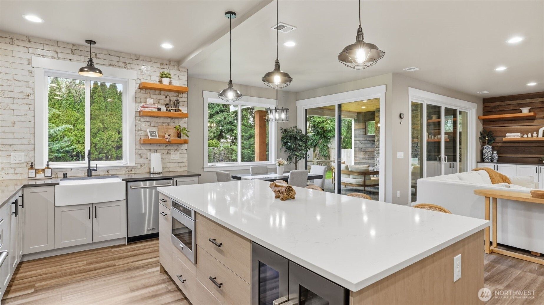 Enjoy sightlines to the large backyard and covered patio.