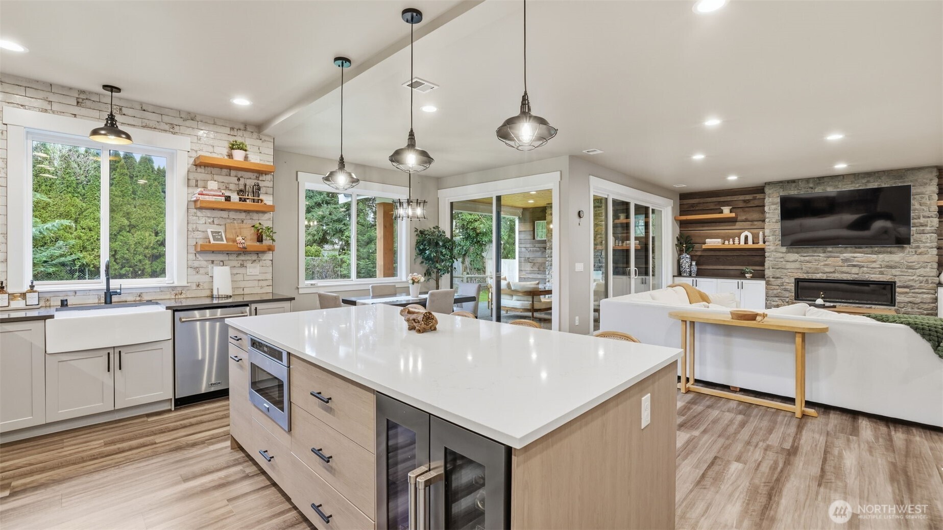 Don't miss the wine fridge and microwave in the oversized island.