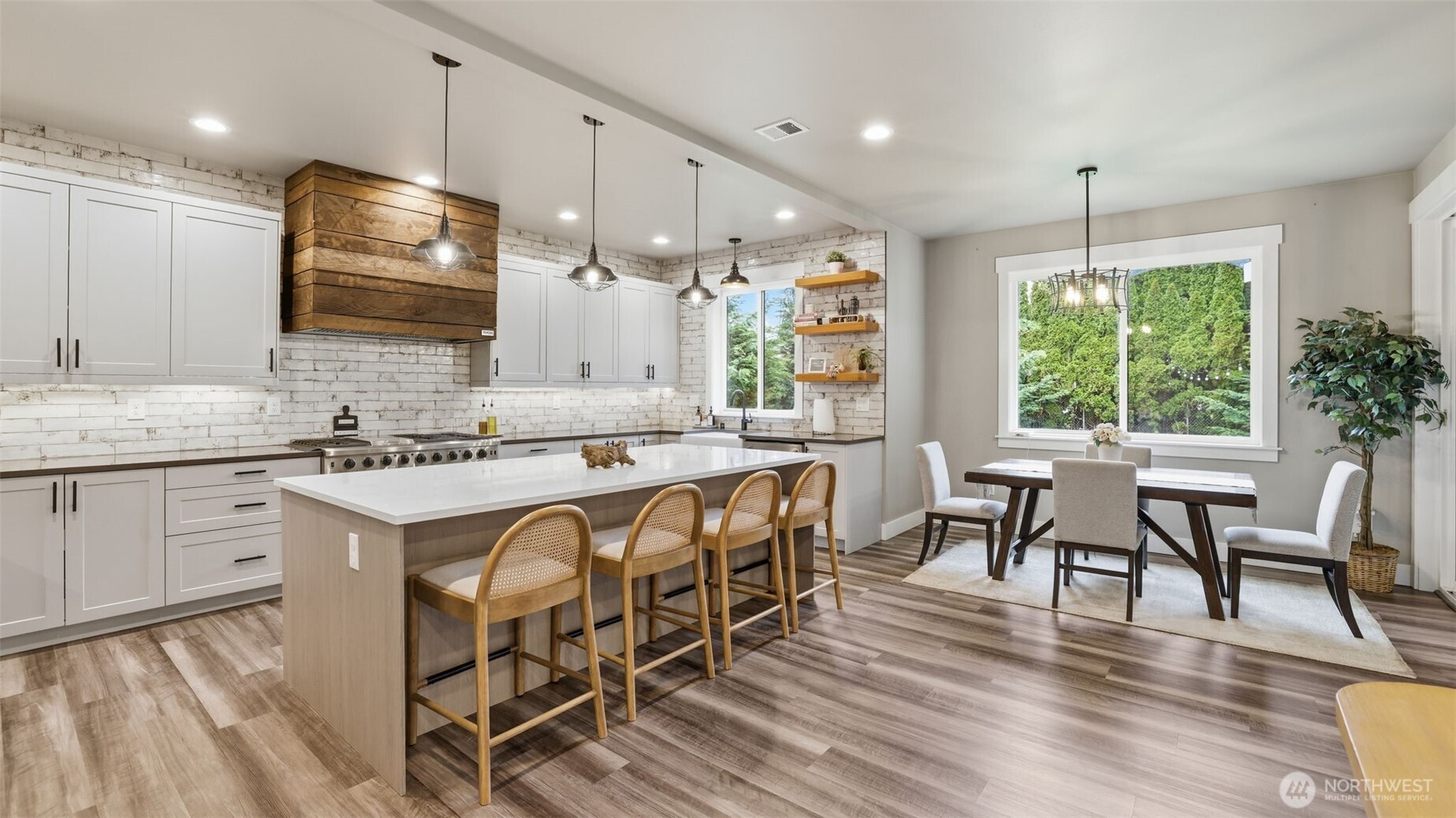 Dining area off of the kitchen, eat at the island or the dining room table.