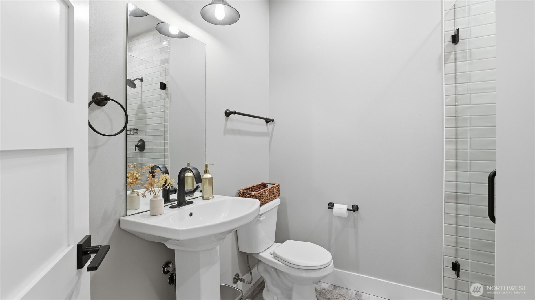 Main floor bathroom that includes a shower. Perfect for main level living and multi-generational living!
