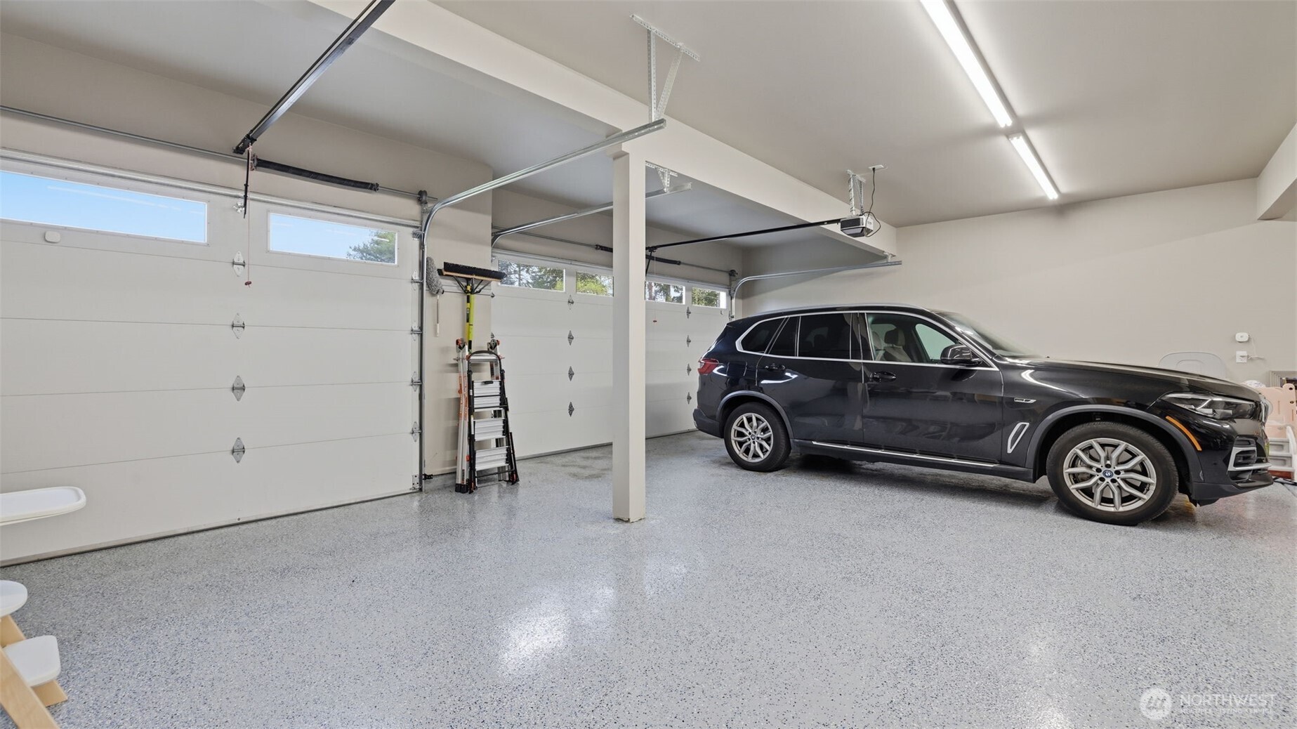 Rare 5-car garage with enamel flooring.