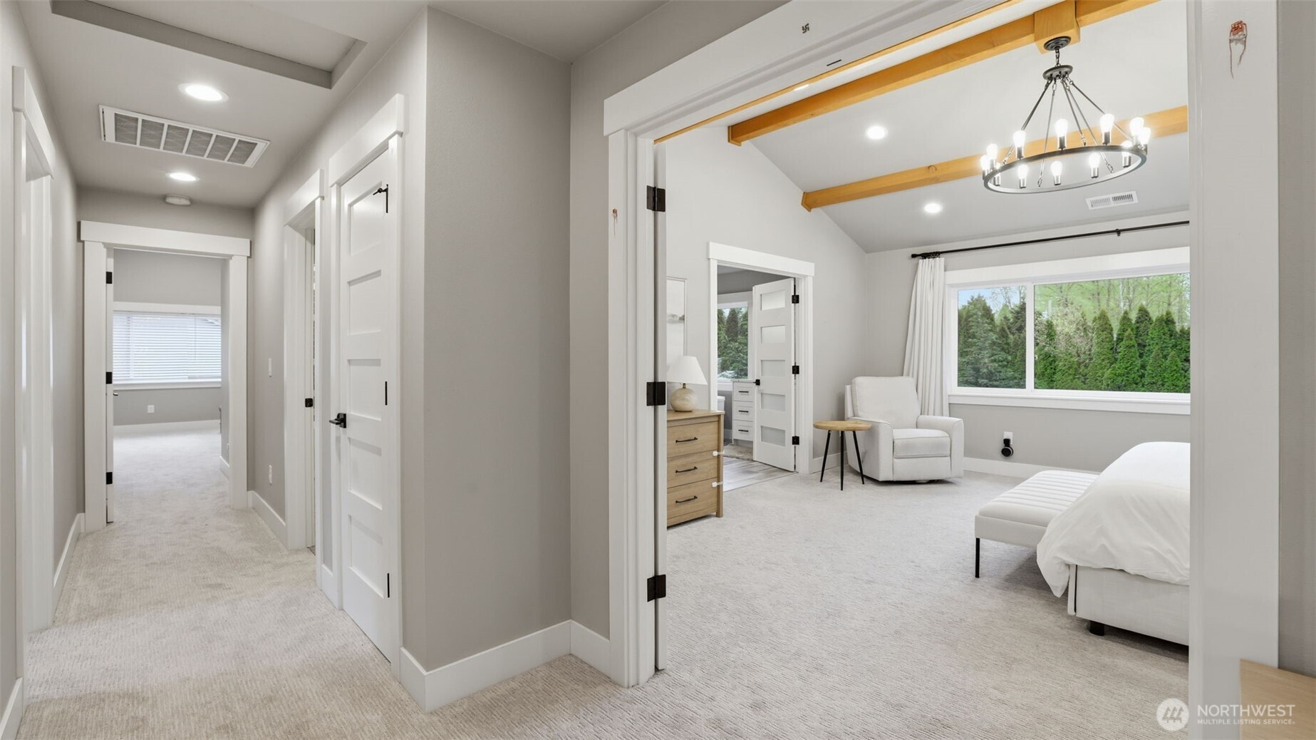 Large double doors welcomes you to the primary suite.