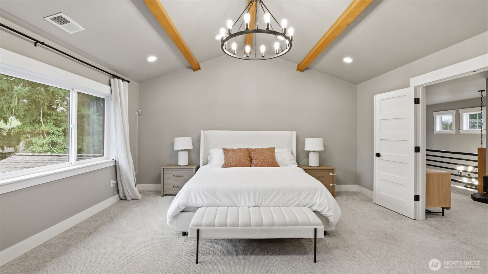 Don't miss the stunning chandelier over the bed