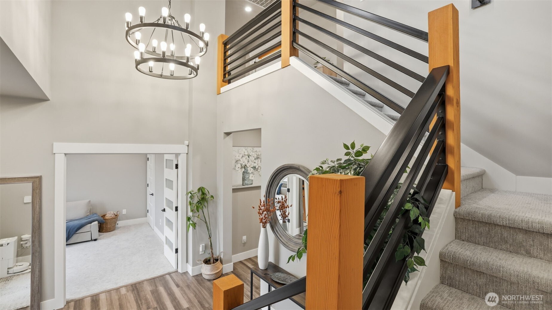 Trendy light fixtures including this modern chandelier.