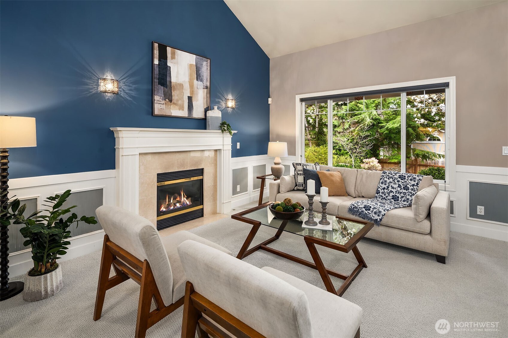 Formal living with gas fireplace.