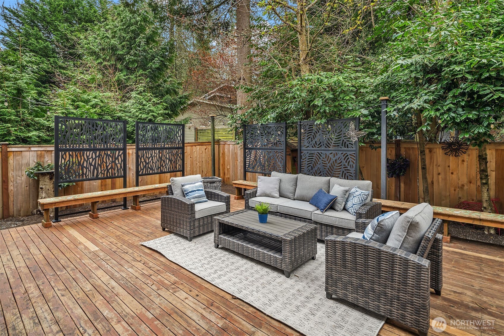 Extra large patio with mature landscaping for your ultimate backyard hangout and privacy!