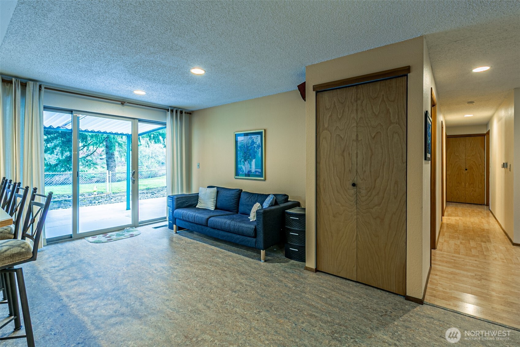 The dining room and hallway are seen here.