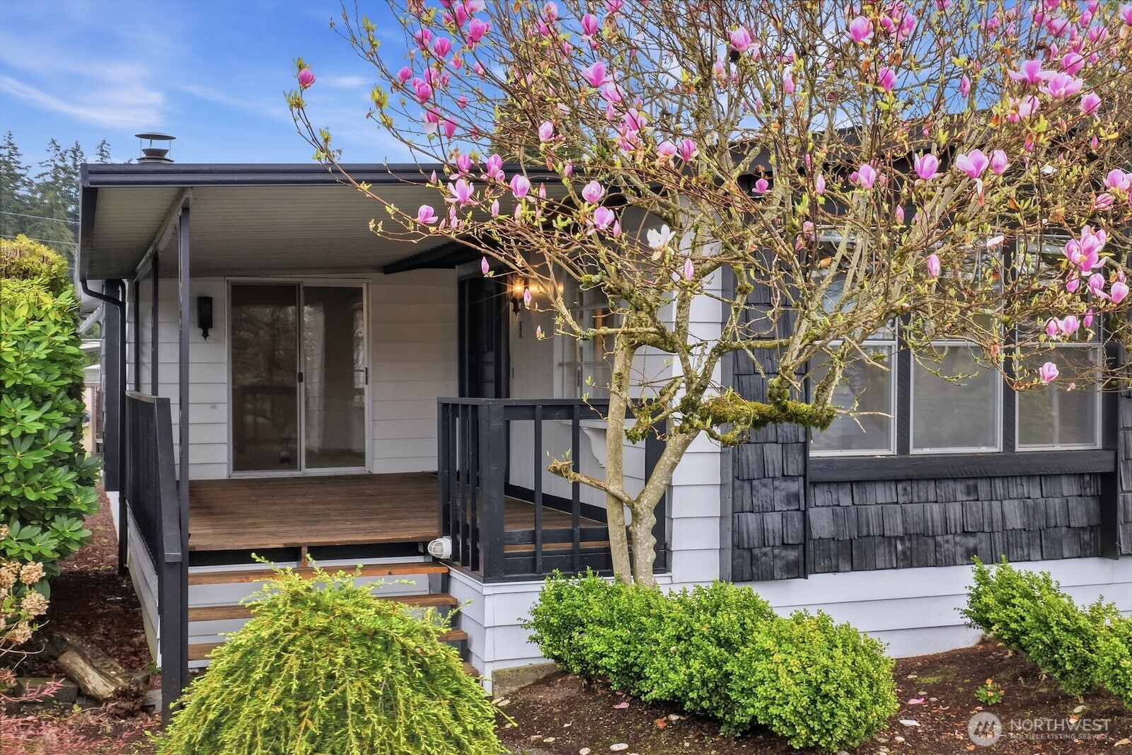 left side of home with with access to the front door