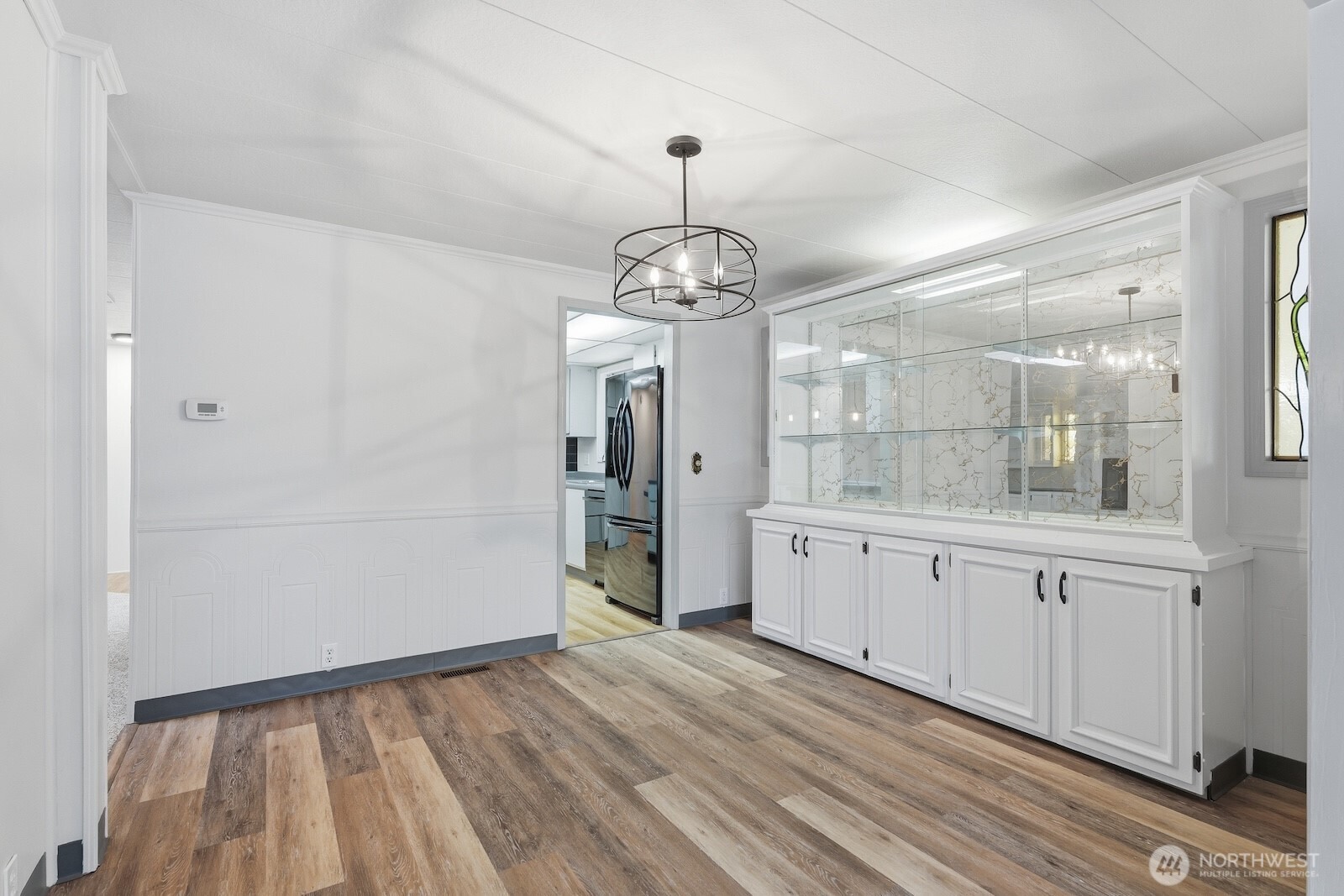 Another view of the dining room with new LVP flooring