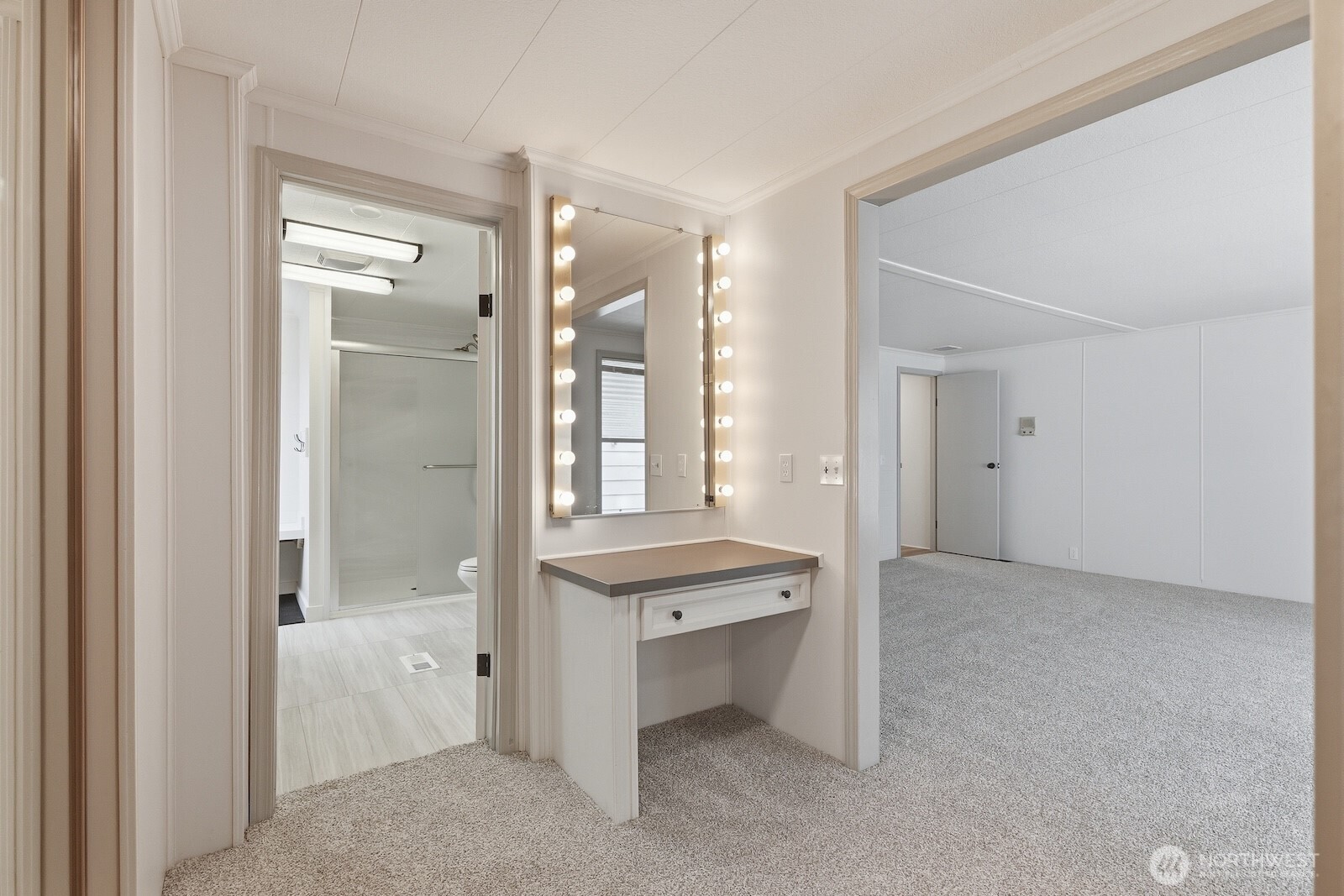 Generous walk-through wardrobe with built-in vanity
