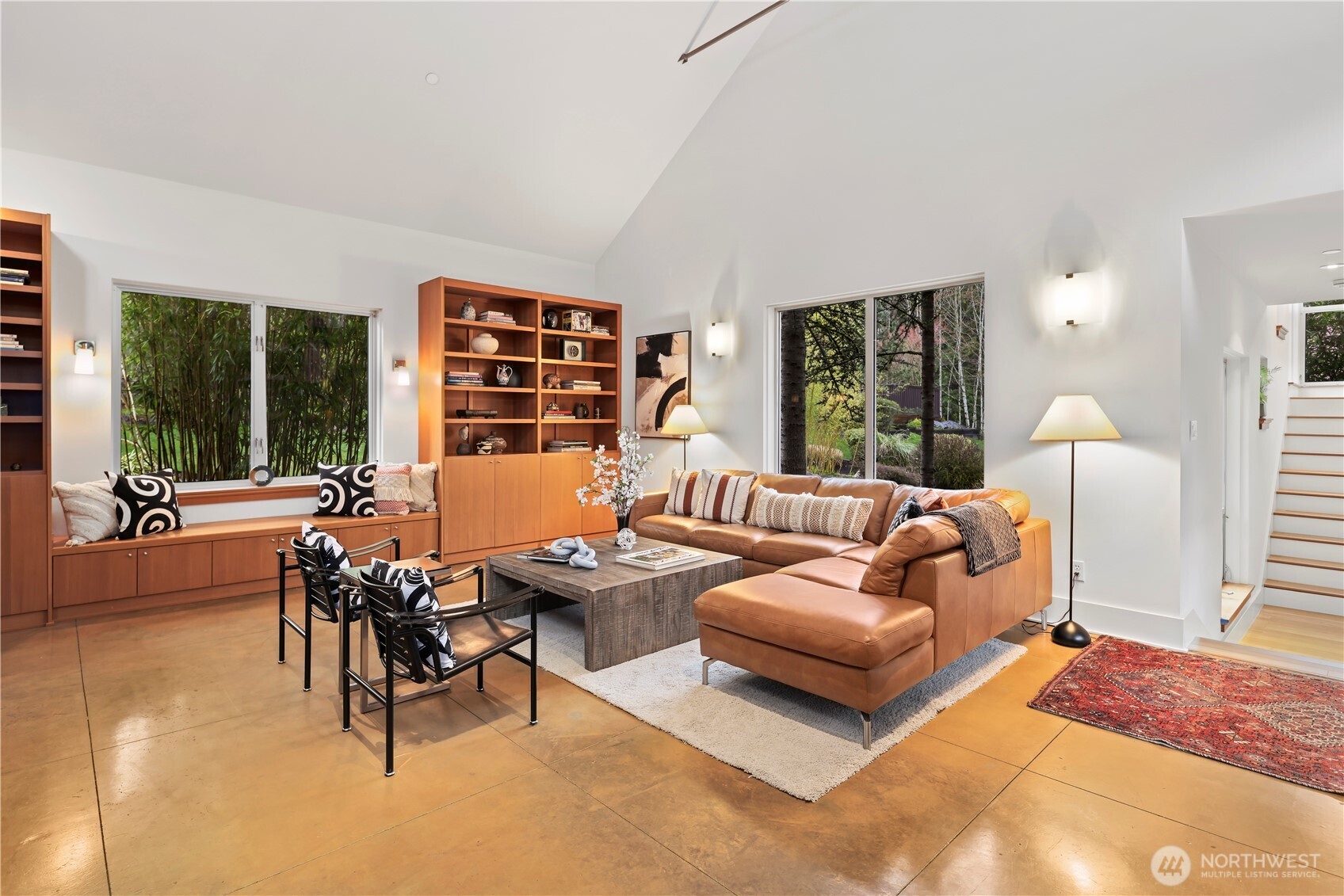 To the right of the entry, the living room