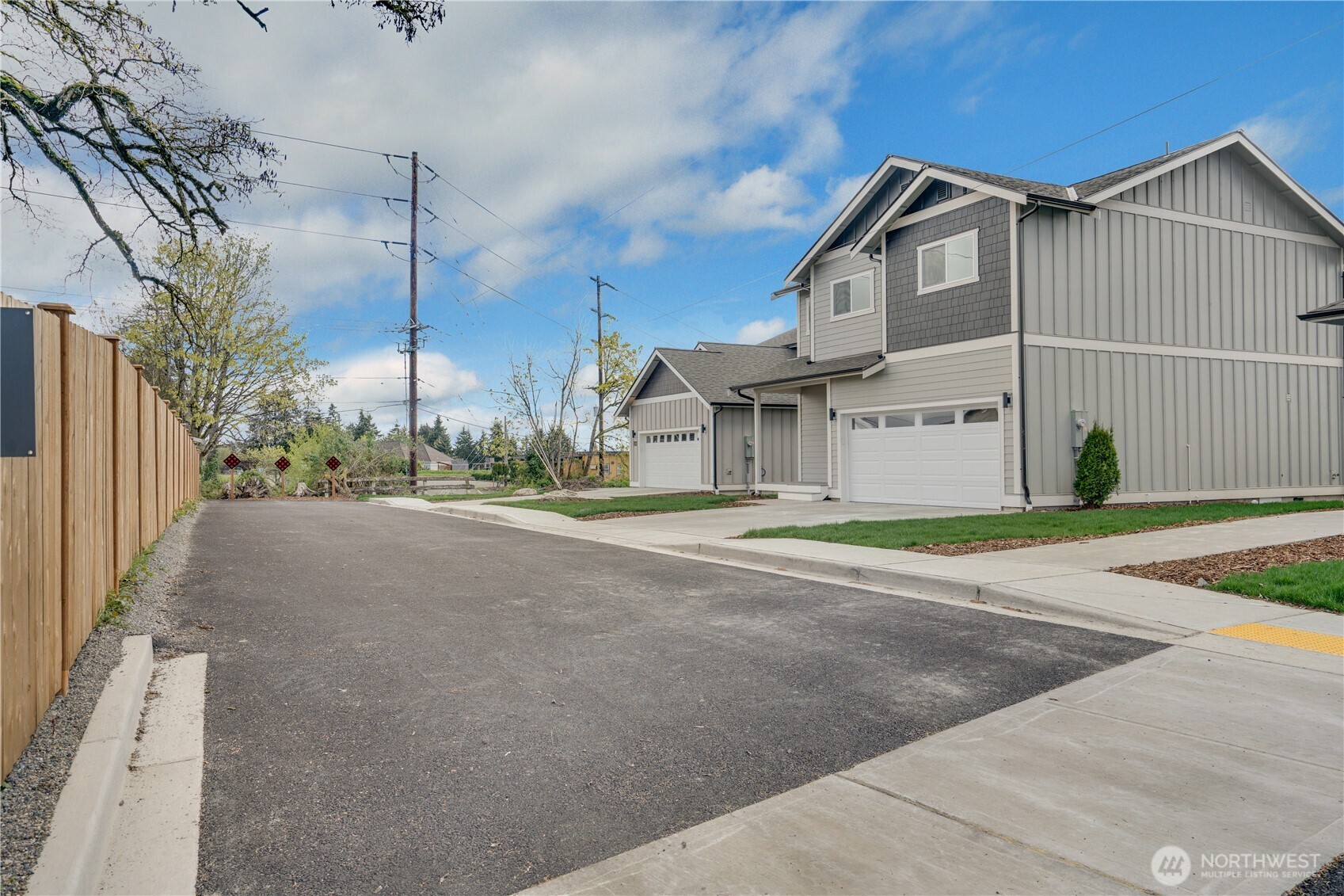 Three new homes here on this quiet road.