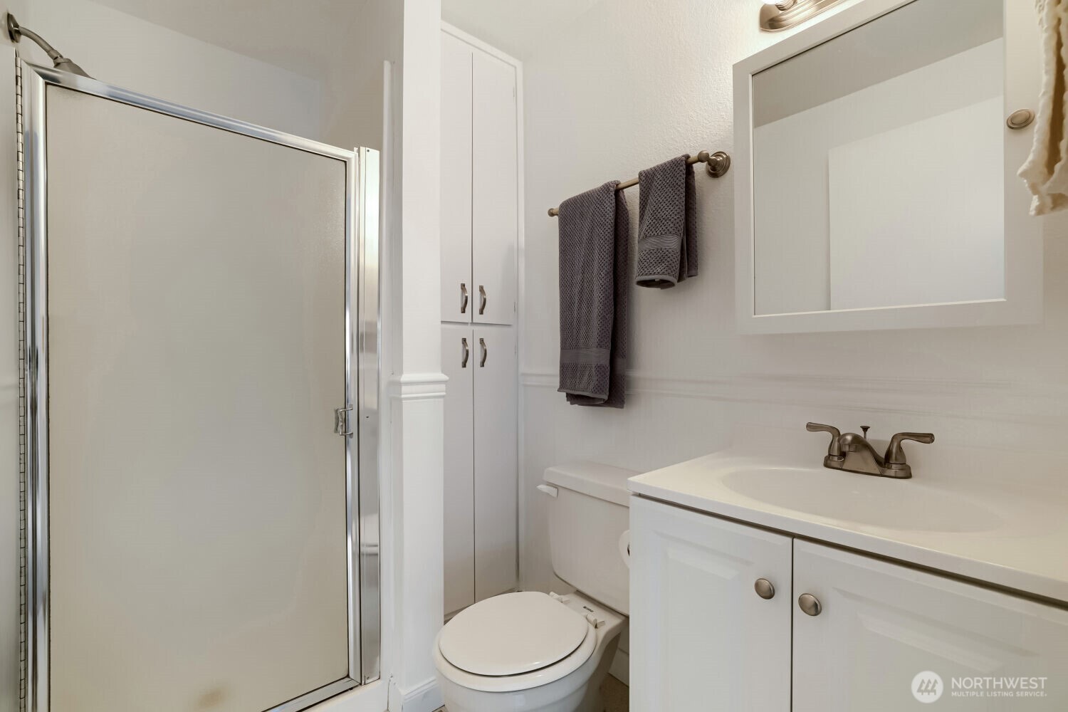 Primary with large mirrored closet doors