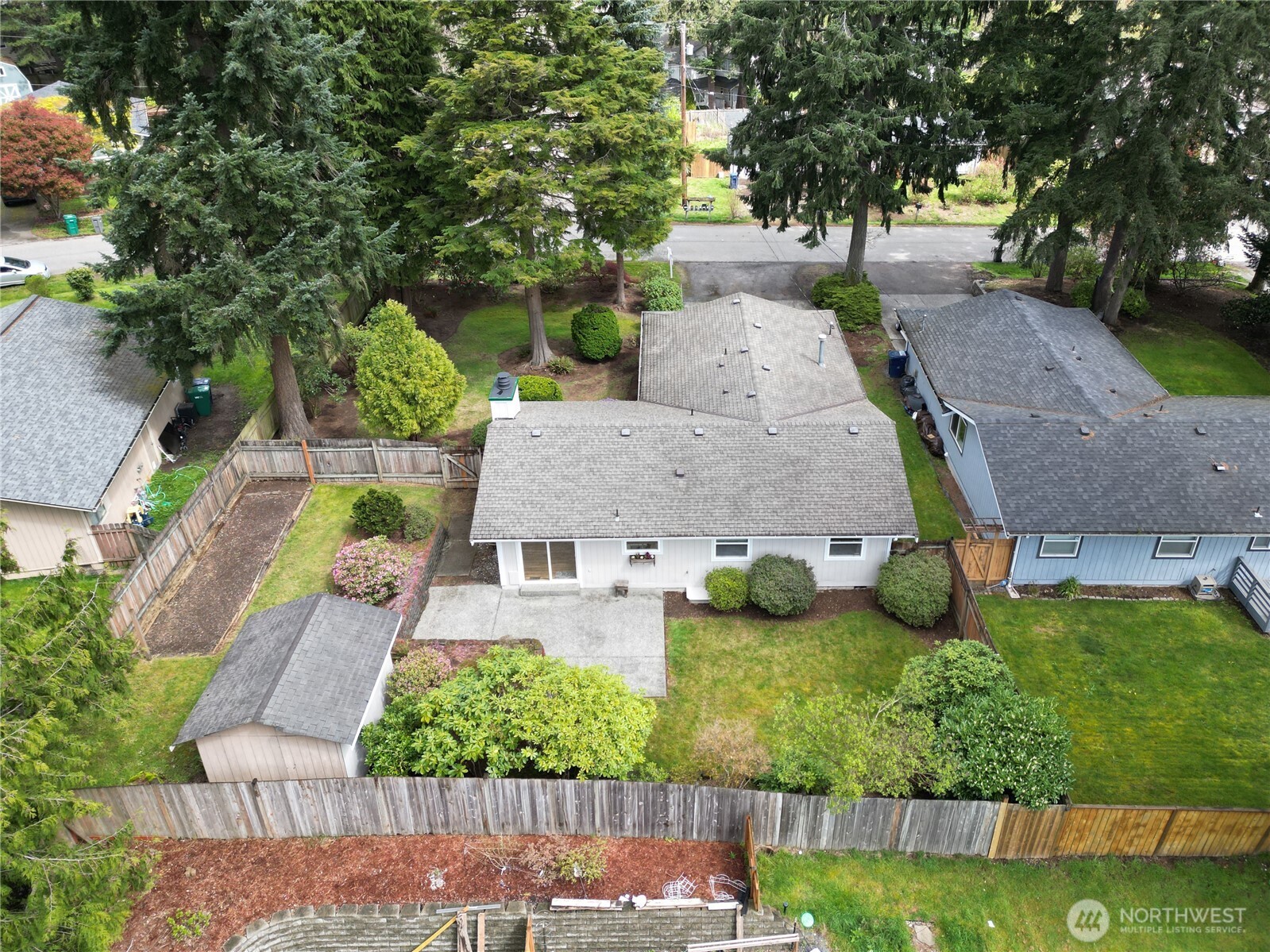 Newly refinished hardwoods and a wood burning fireplace.