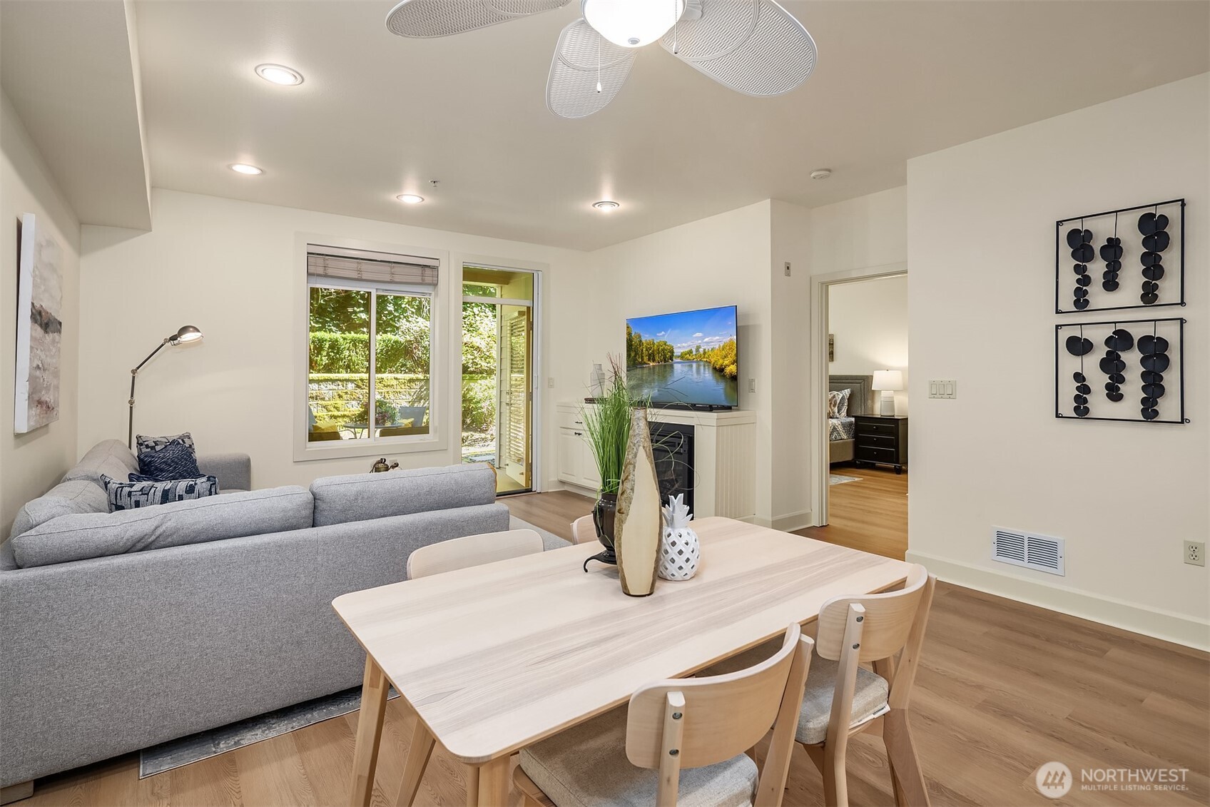 Open concept dining area seamlessly connects top the living space and kitchen