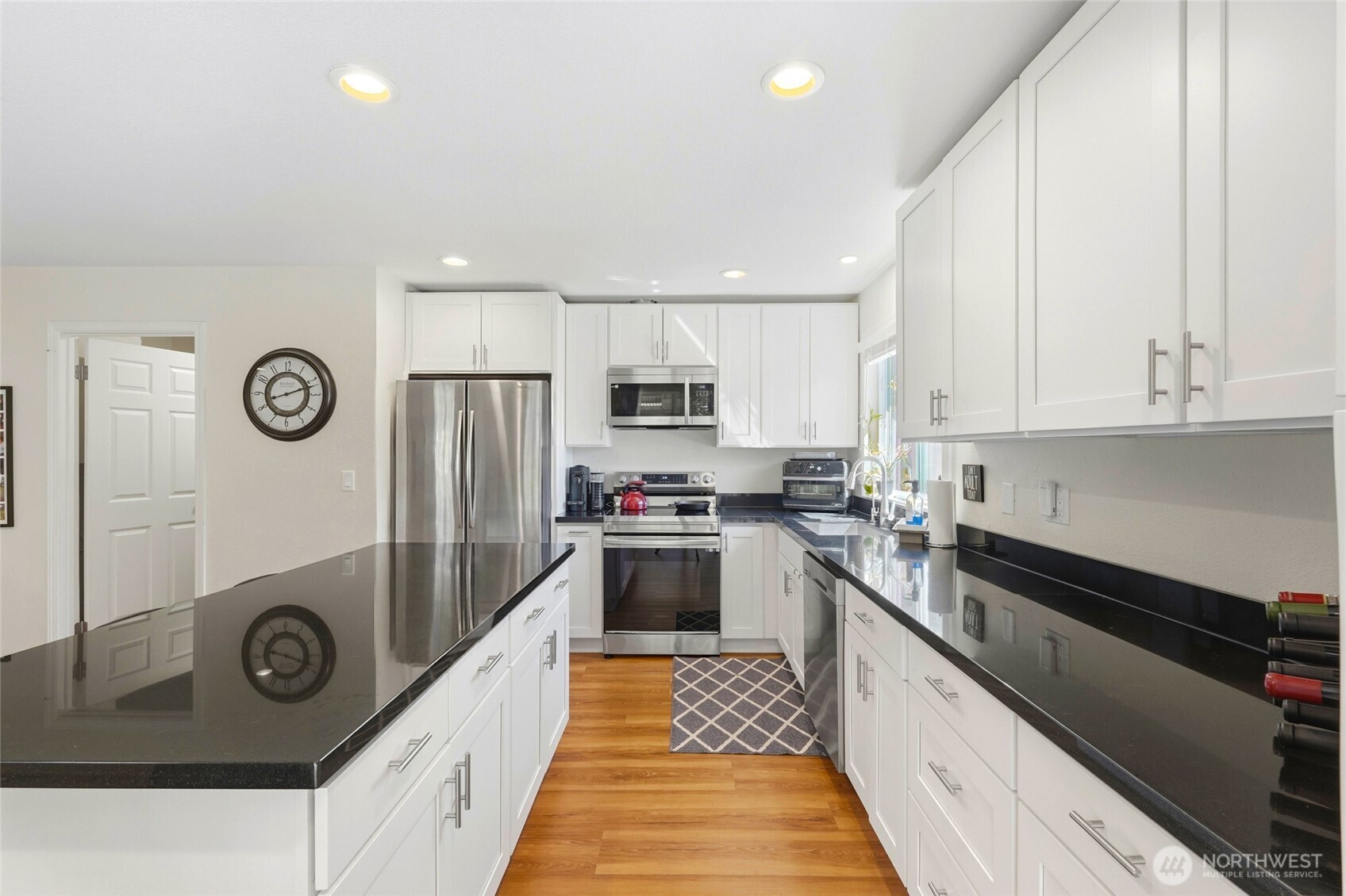 White cabinets and granite countertops