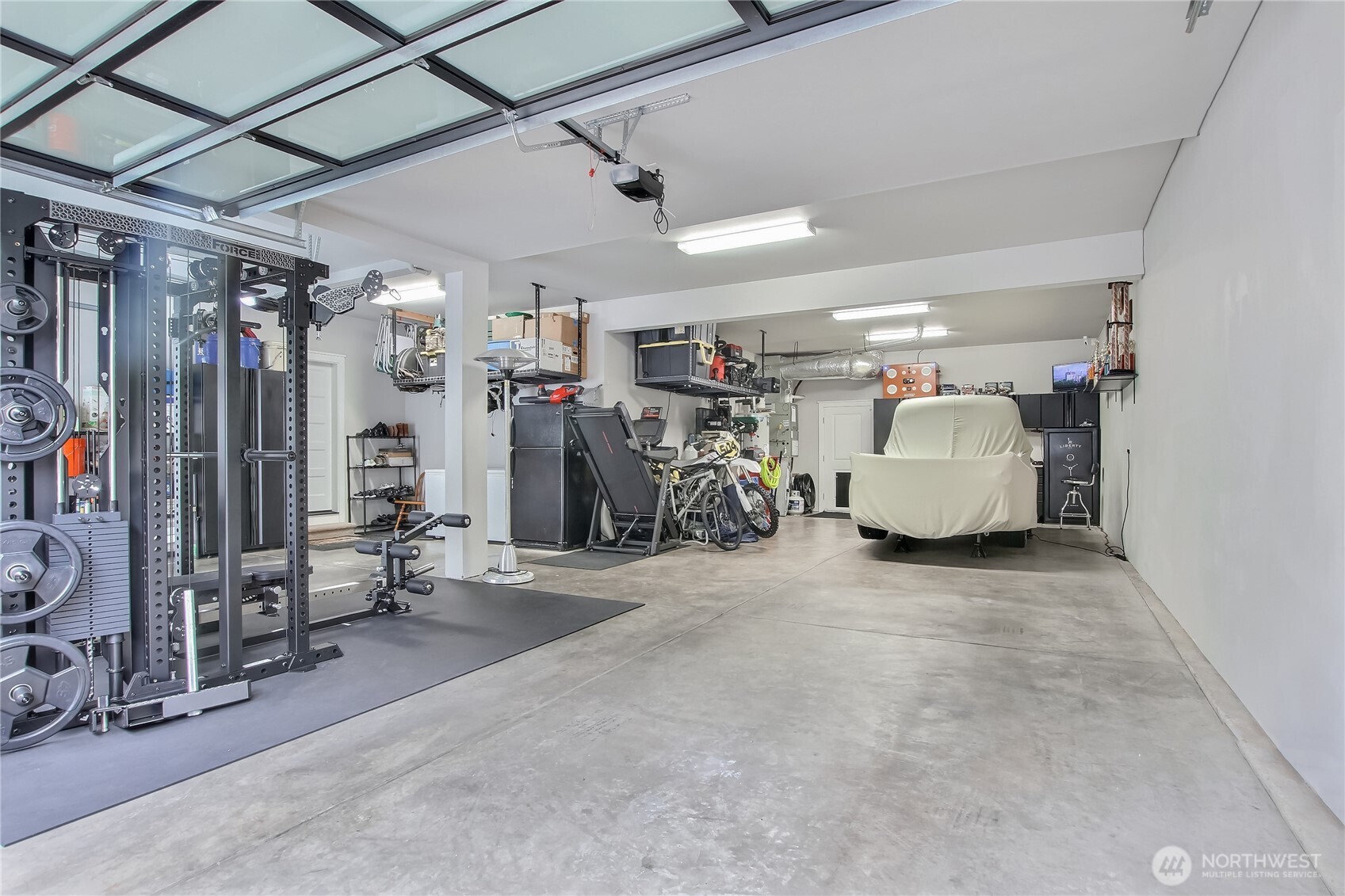 5 car, 1100 sq ft attached garage.