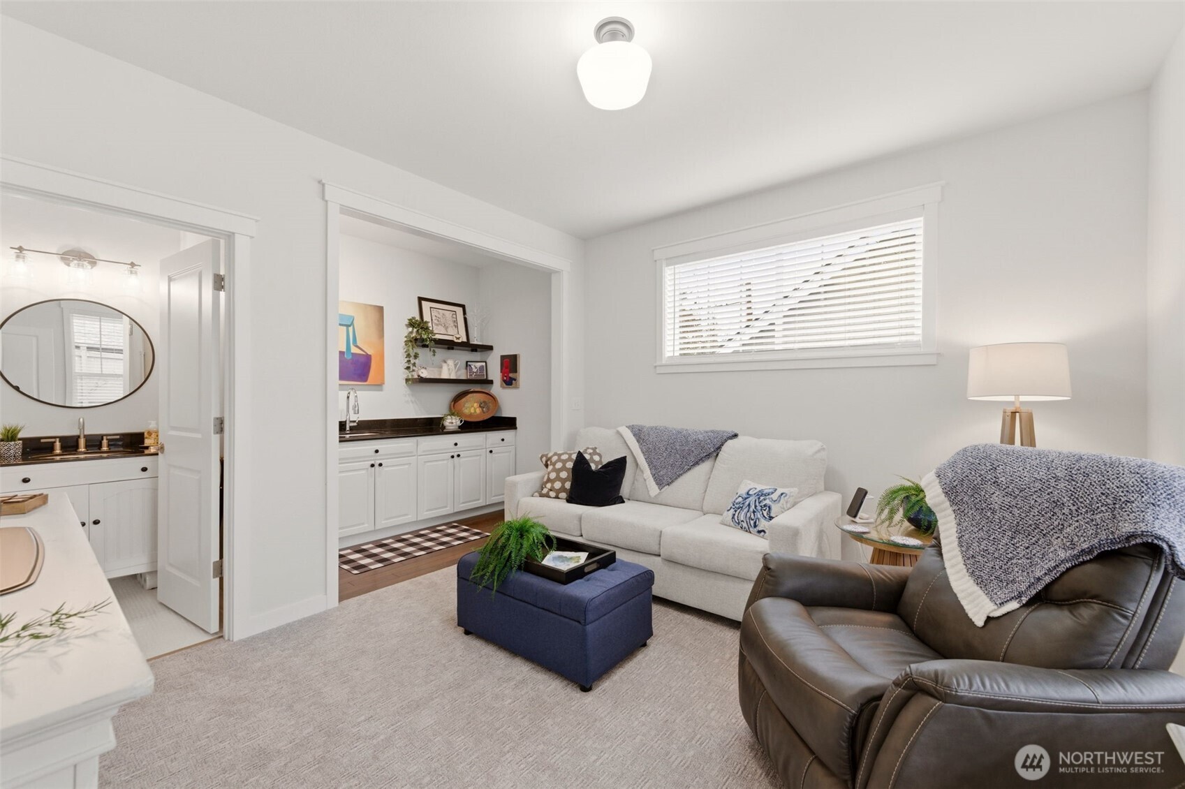 Bonus room on the main floor is located toward the back of the home. Perfect Mother in law space, office, or TV room.